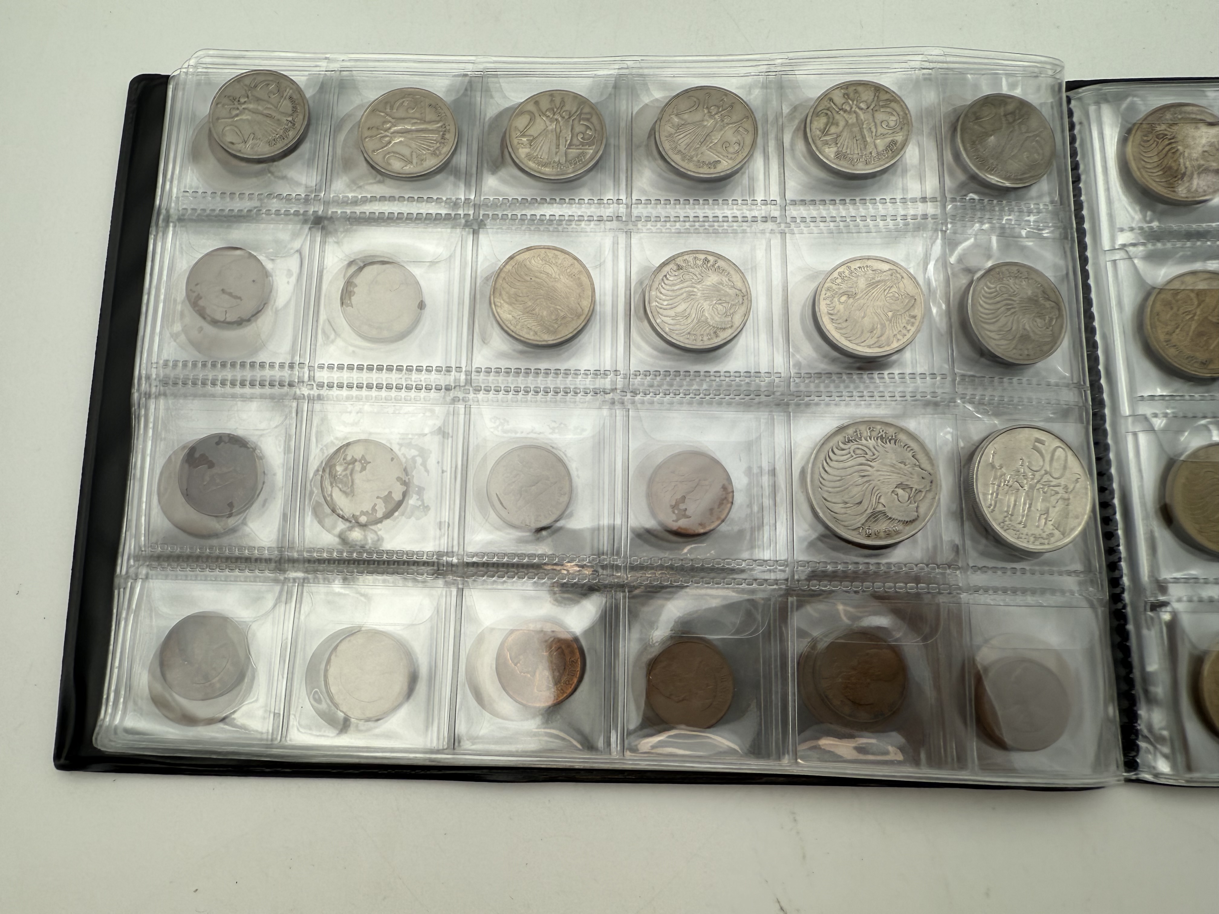 Ethiopia - A collection of several hundred coins arranged in a special coin album, various conditions and years - 1 2