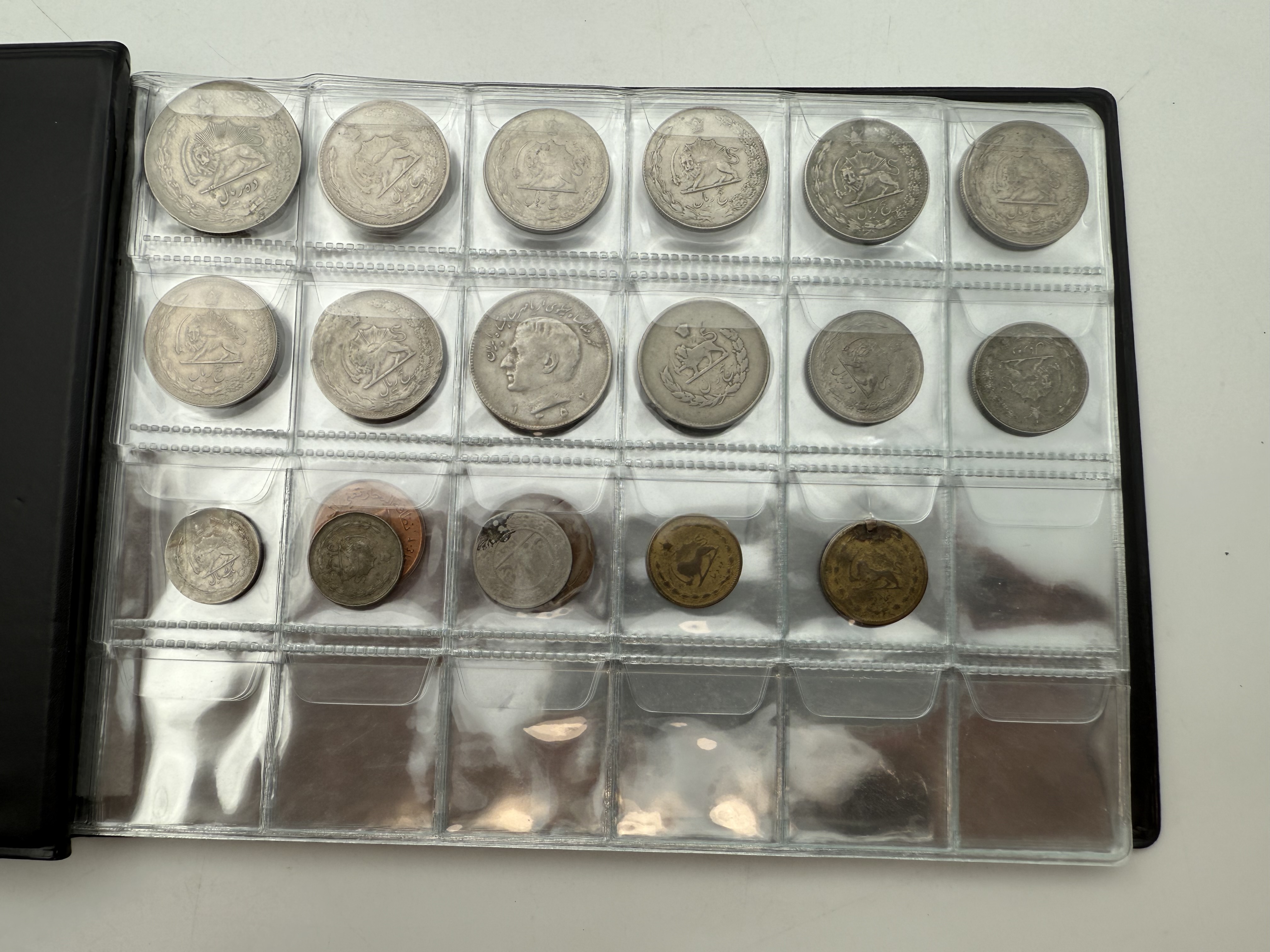 Iran / Lebanon / Malaysia / United Arab Emirates - a collection of several dozents coins arranged in a special coin ... - 1 3