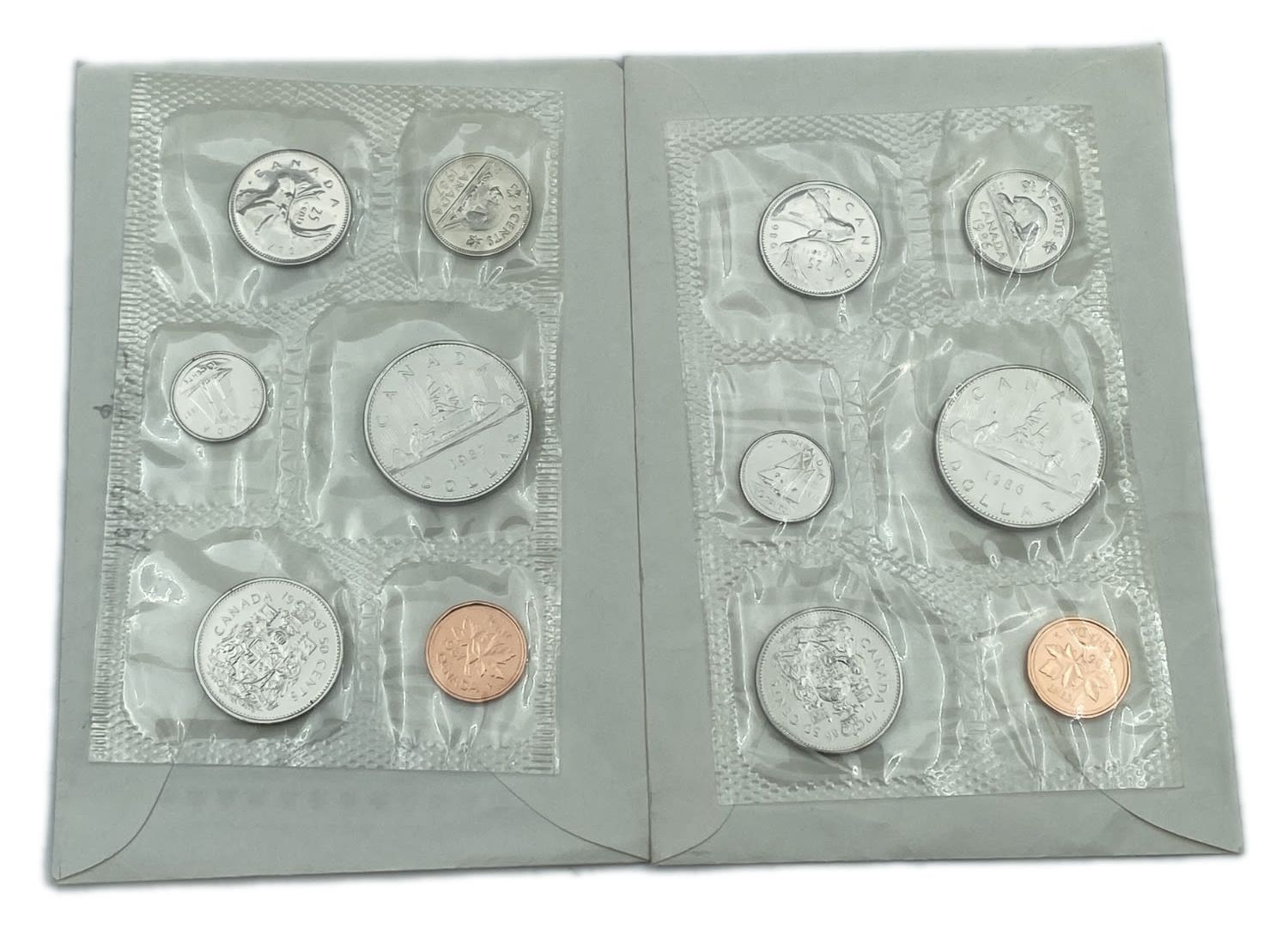Canada - a pair of coin sets of 6 coins each from the years 1986, 1987 - 1 0
