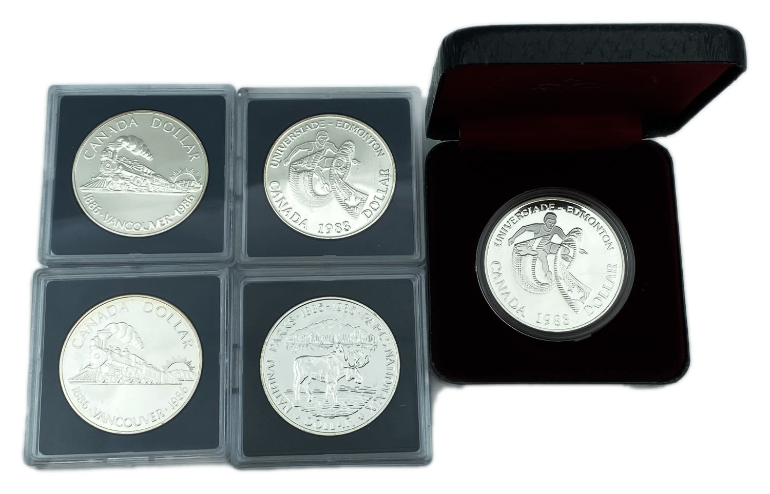 Canada - lot of 5 silver dollar coins from 1983, 1985 1986 - made of silver - 1 0