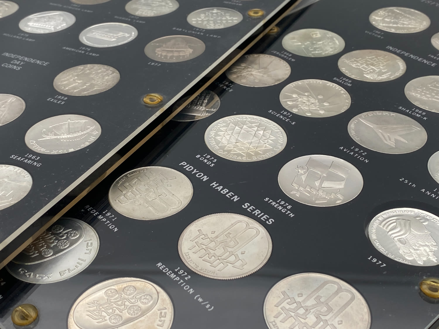 Israel - a group of 47 coins of the Israeli government company for coins and medals in two perspex display ... - 1 2