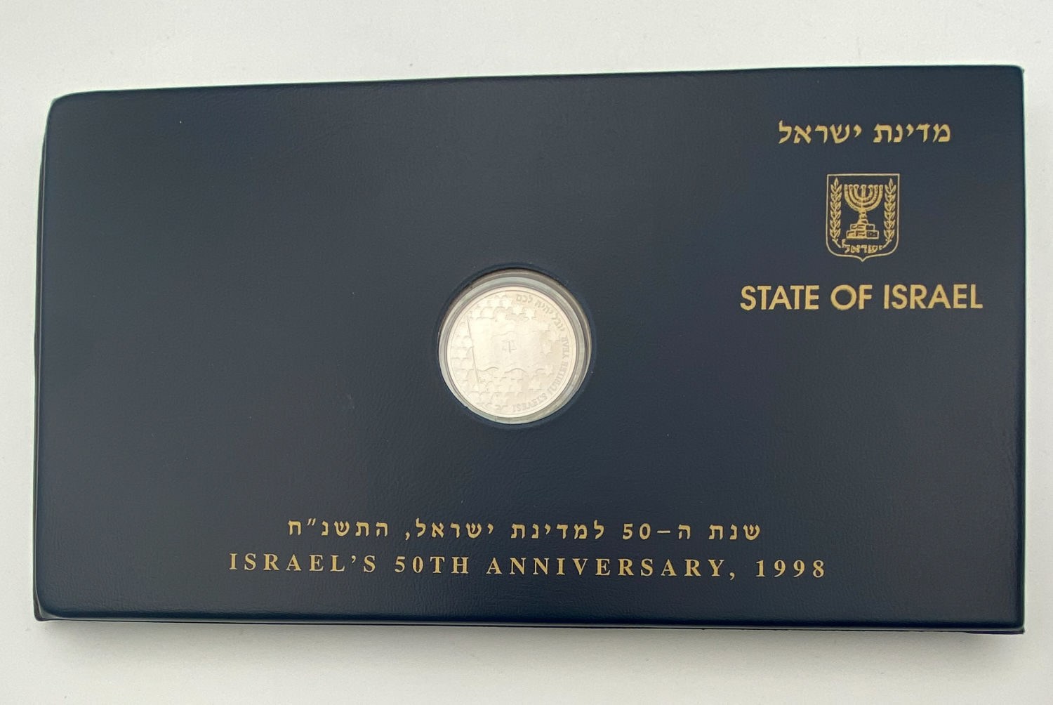 Israel - Lot of 3 folders containing a coin and a silver medal of the government company and banknotes
... - 1 19