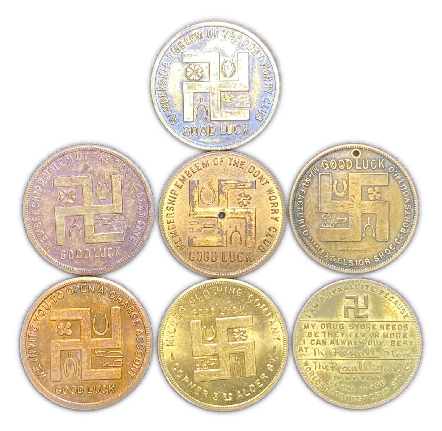 USA - Lot of 7 store tokens with swastikas on them (tokens were made before World War II, while this was considered ... - 1 0