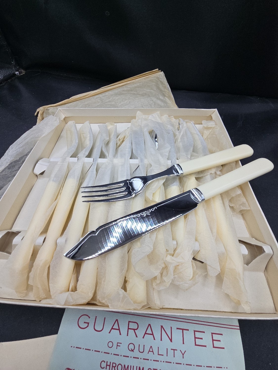 A Boxed Set of Mid-20th Century Sheffield Chromium Stainless Cutlery with Cream Handles - 1 1