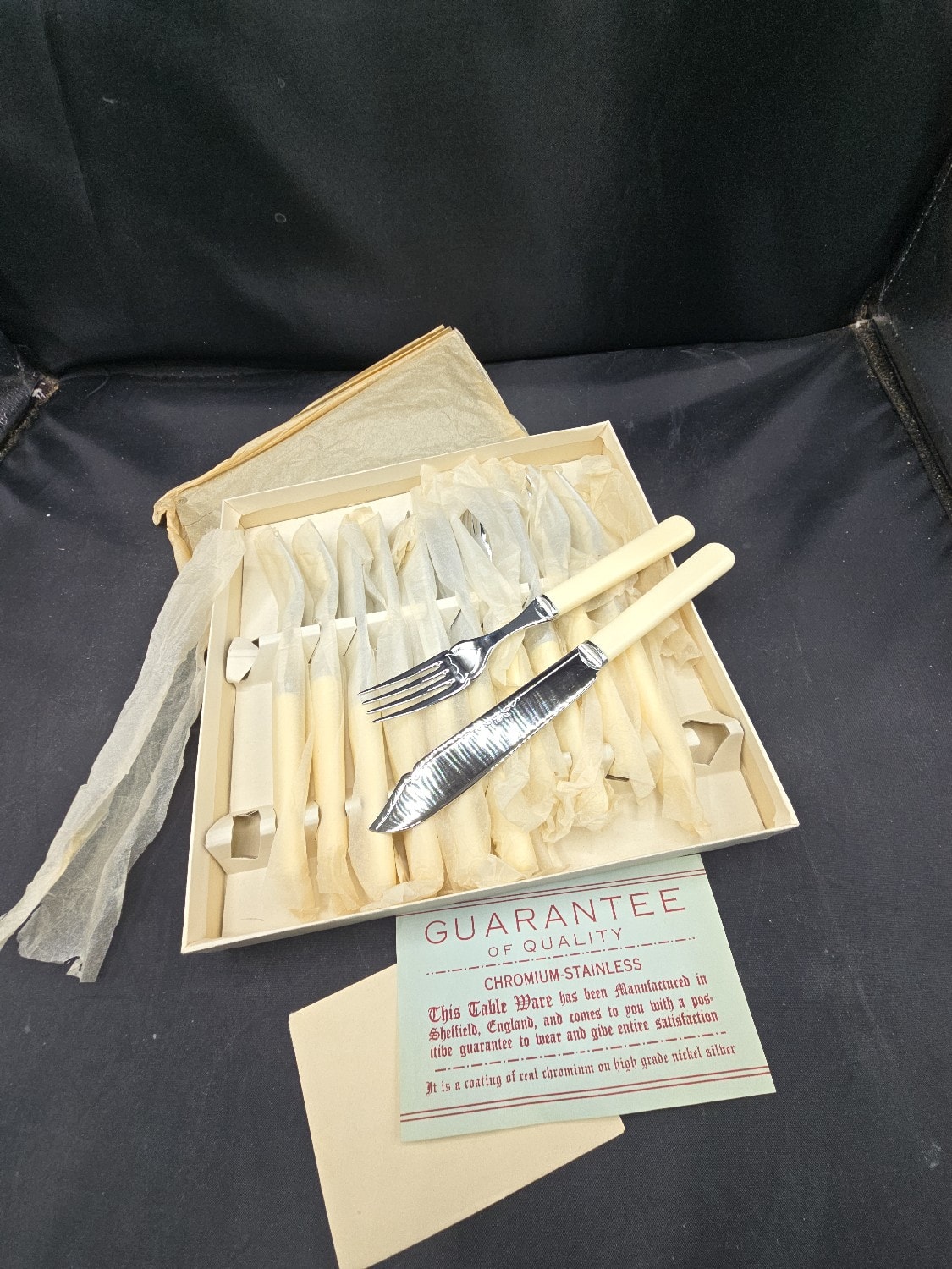 A Boxed Set of Mid-20th Century Sheffield Chromium Stainless Cutlery with Cream Handles - 1 0