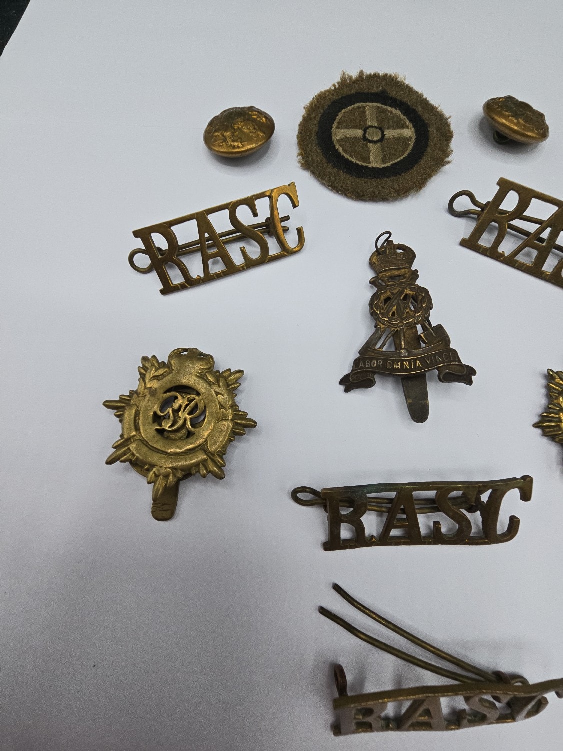 A Collection of Ten British Military Insignia, including a WWI/WWII Labour Corps / Royal Pioneer Corps Cap Badge - 1 2