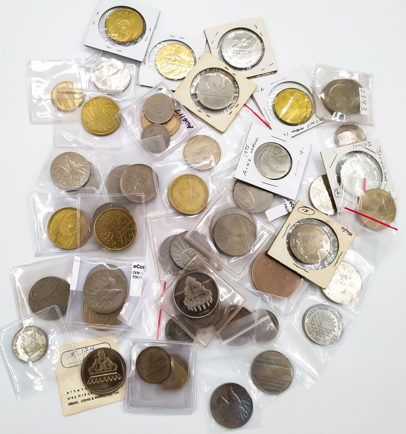 A collection of over 50 numismatics Israeli and US tokens