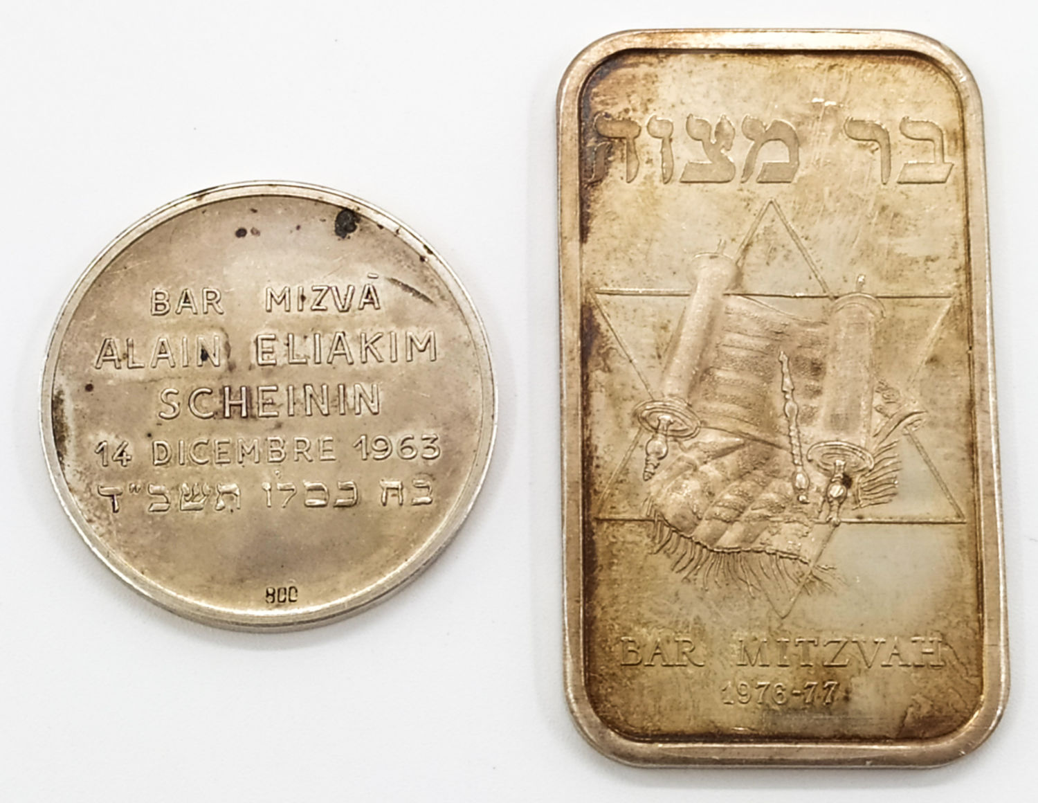 A pair of medals made for Bar Mitzvah - one from the US (One ounce Silver) and the other from Europe (signed "800")