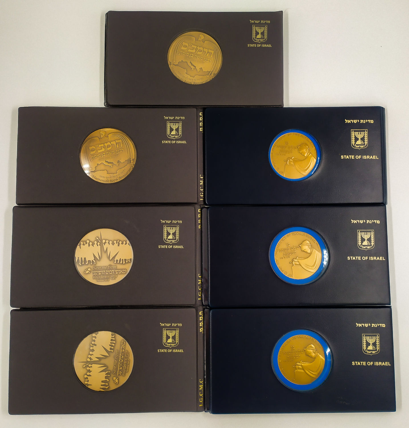 Collection of 7 sets of medals - high quality and informative folders of the government company - 1 0