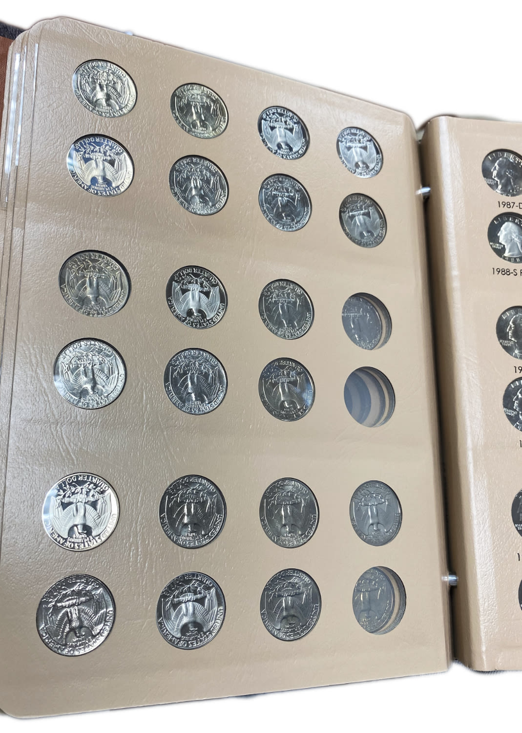 USA - 73 coins of 25 cent 1932-1998 - Are in an album of the Dansco company - Almost all coins are in UNC condition - 1 12