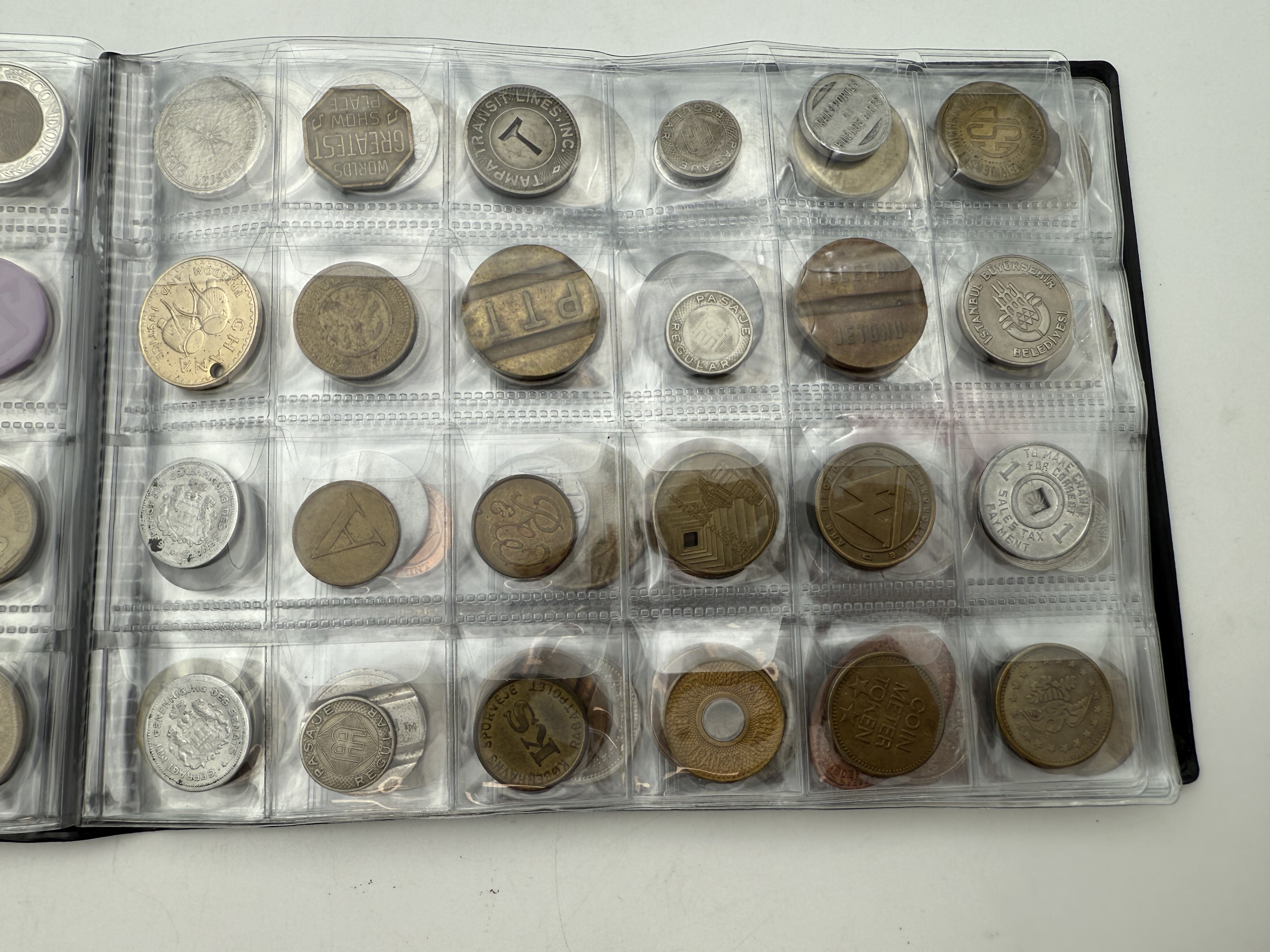 World - A collection of several hundred tokens and medals from several different countries, arranged in a special ... - 1 17