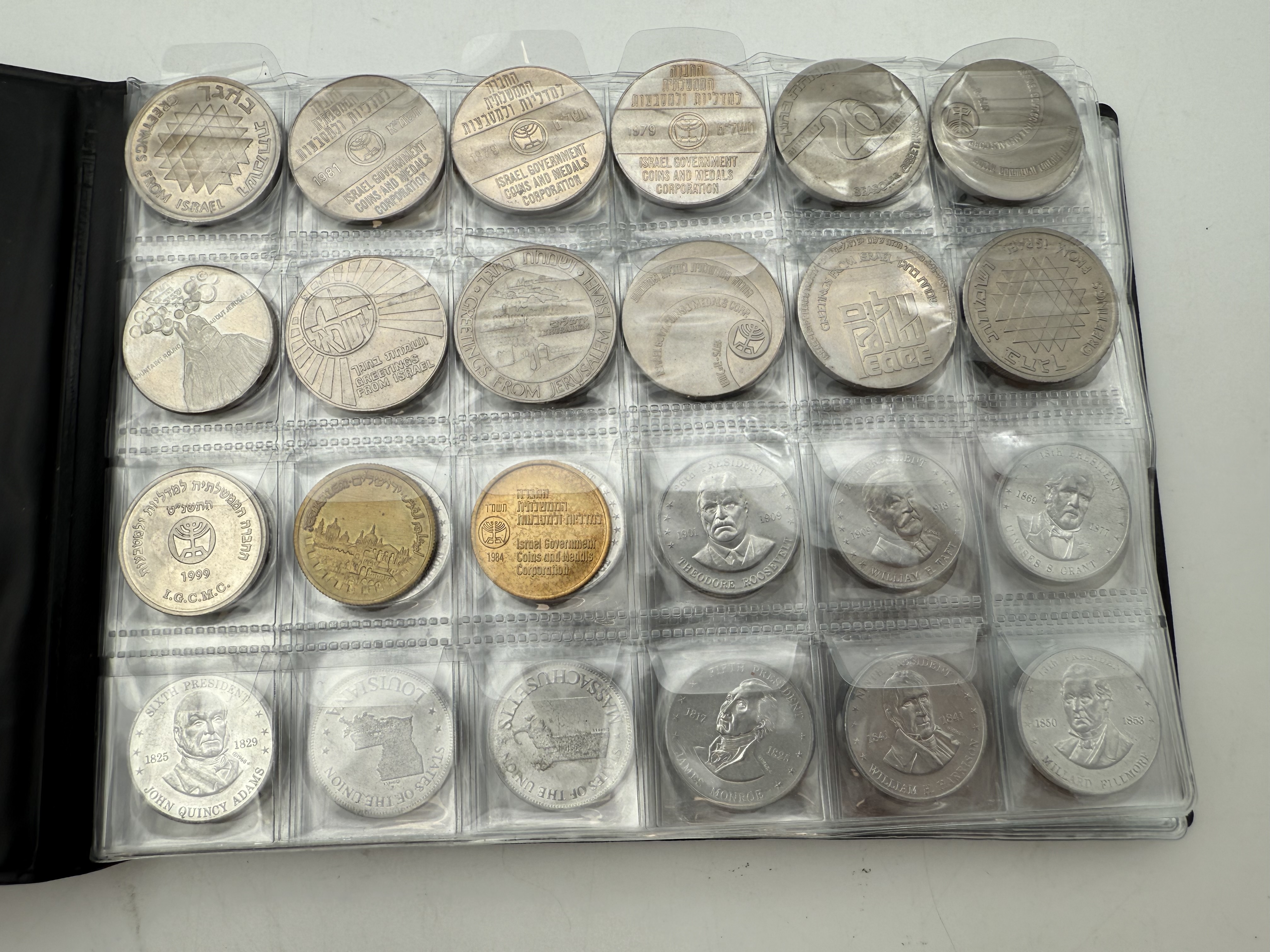 World - A collection of several hundred tokens and medals from several different countries, arranged in a special ... - 1 11