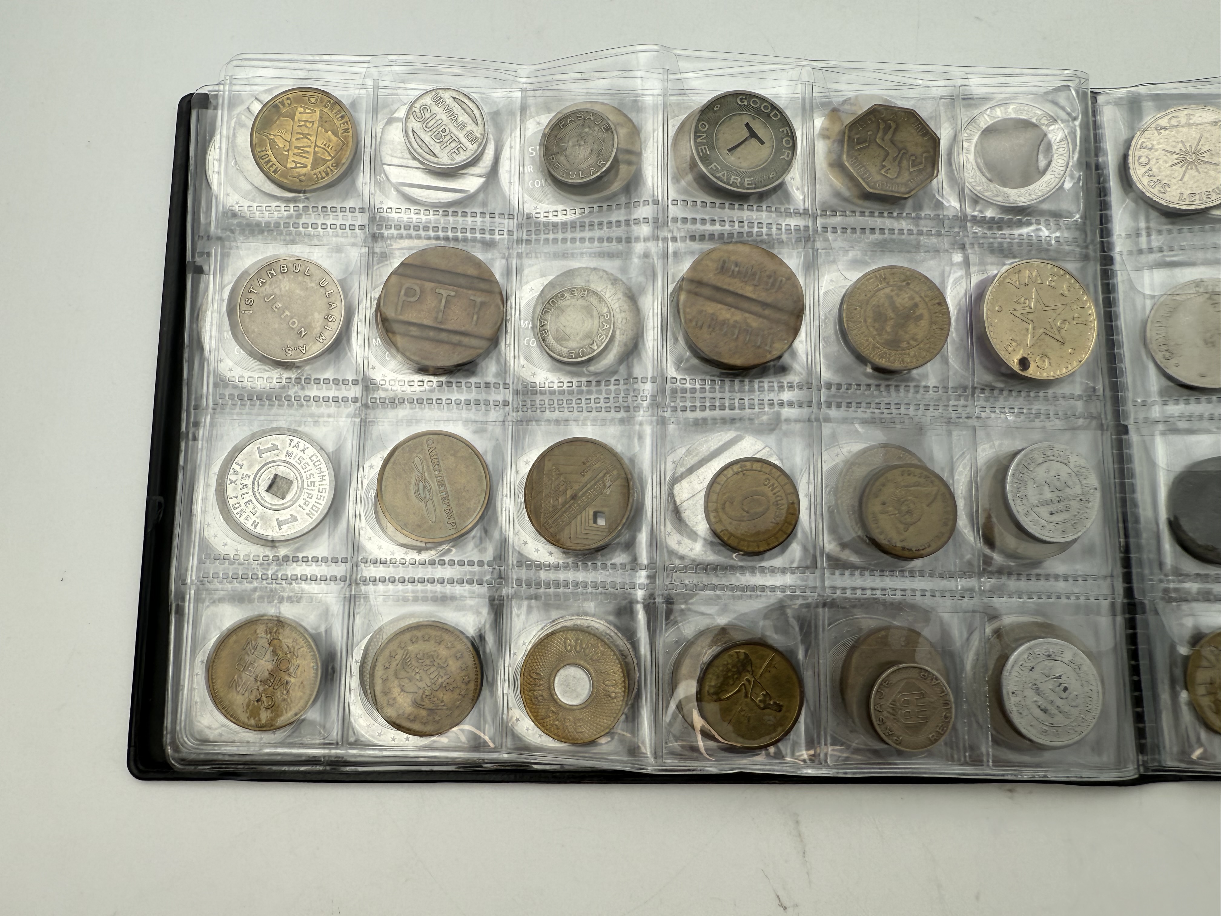 World - A collection of several hundred tokens and medals from several different countries, arranged in a special ... - 1 18