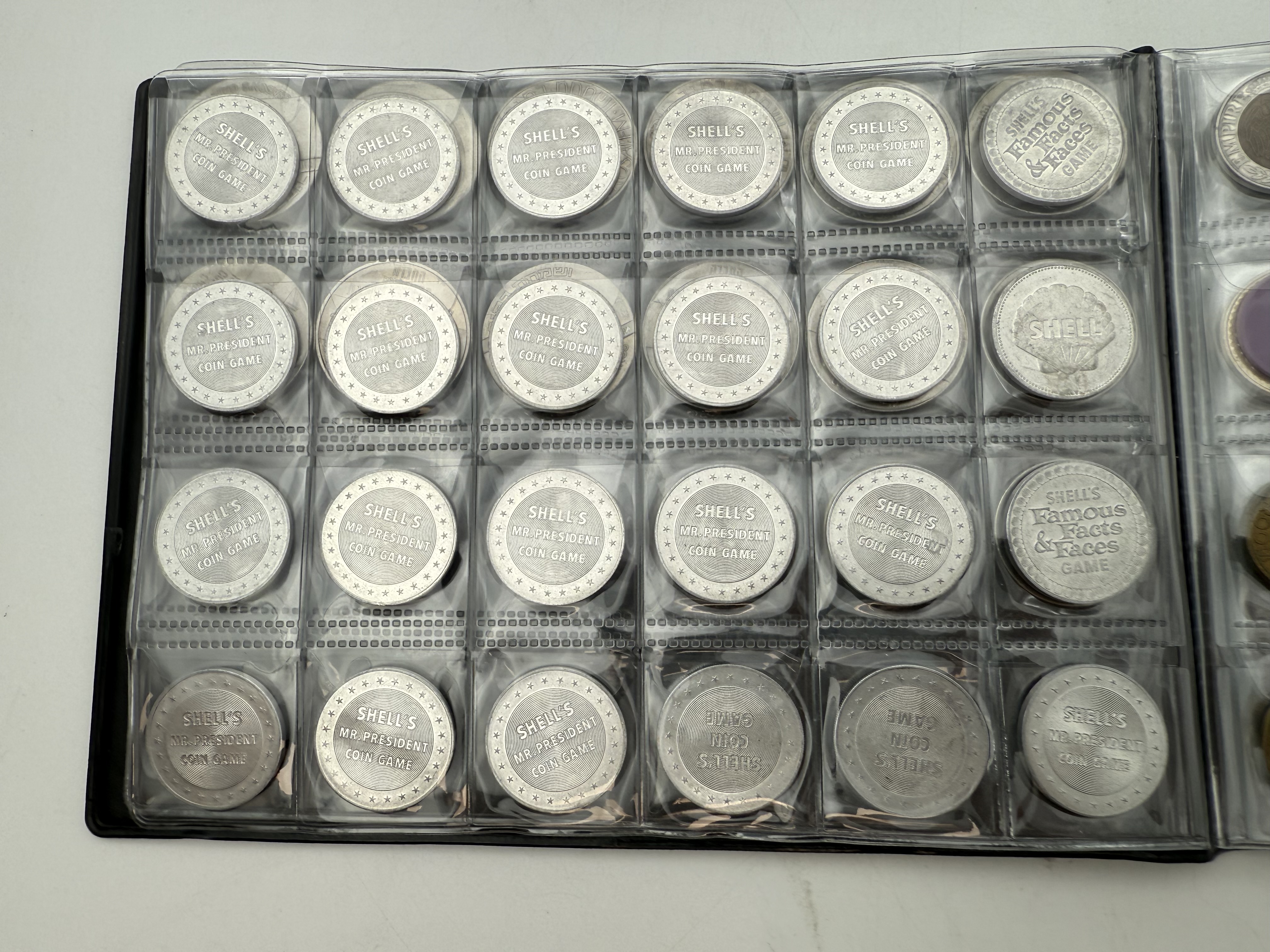 World - A collection of several hundred tokens and medals from several different countries, arranged in a special ... - 1 14