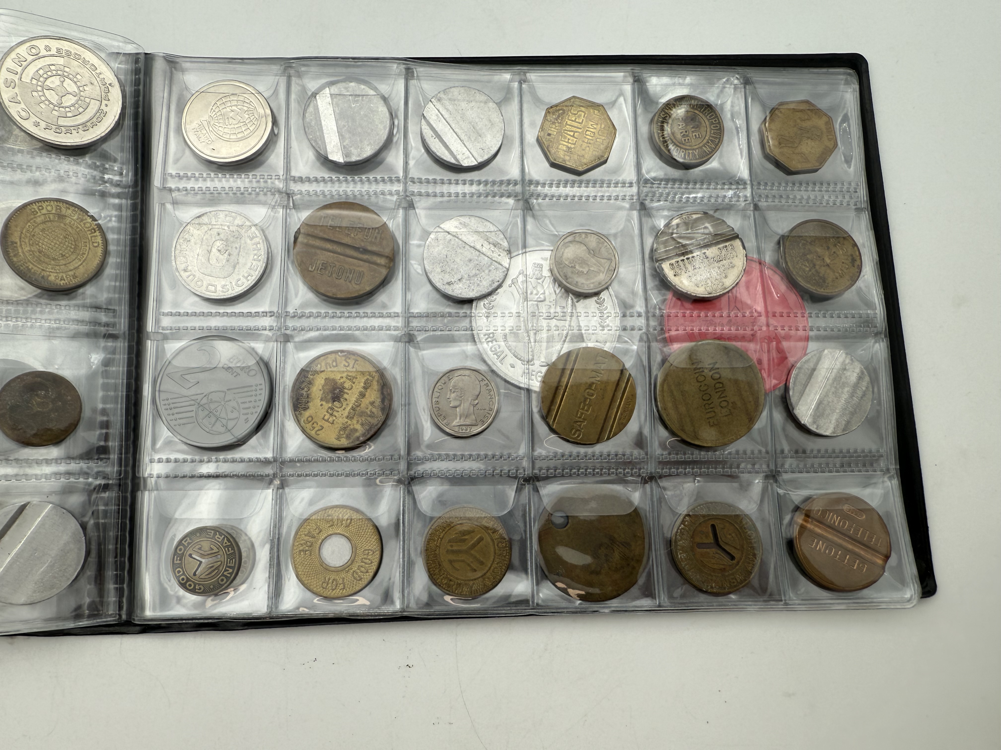 World - A collection of several hundred tokens and medals from several different countries, arranged in a special ... - 1 7