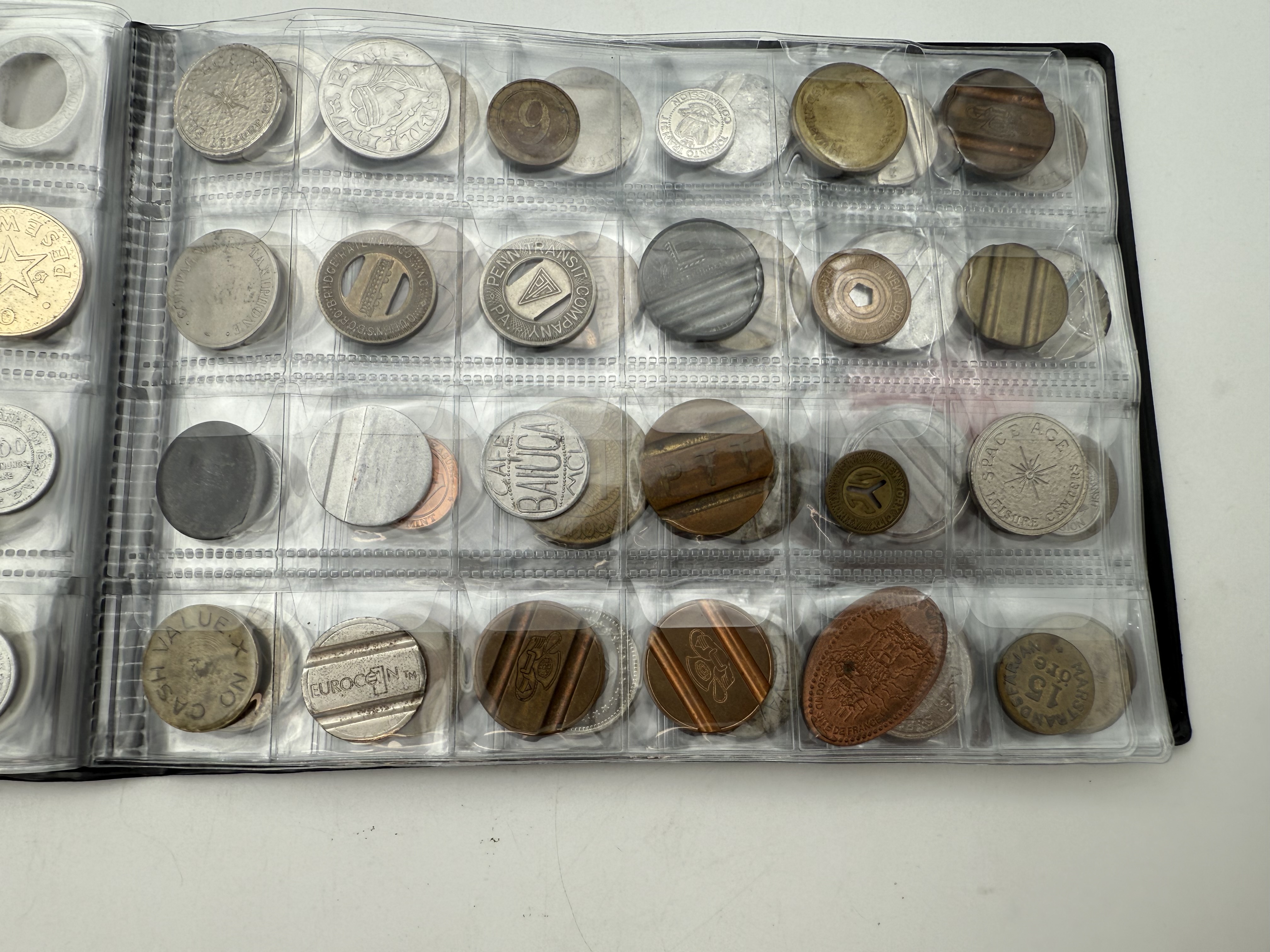 World - A collection of several hundred tokens and medals from several different countries, arranged in a special ... - 1 1