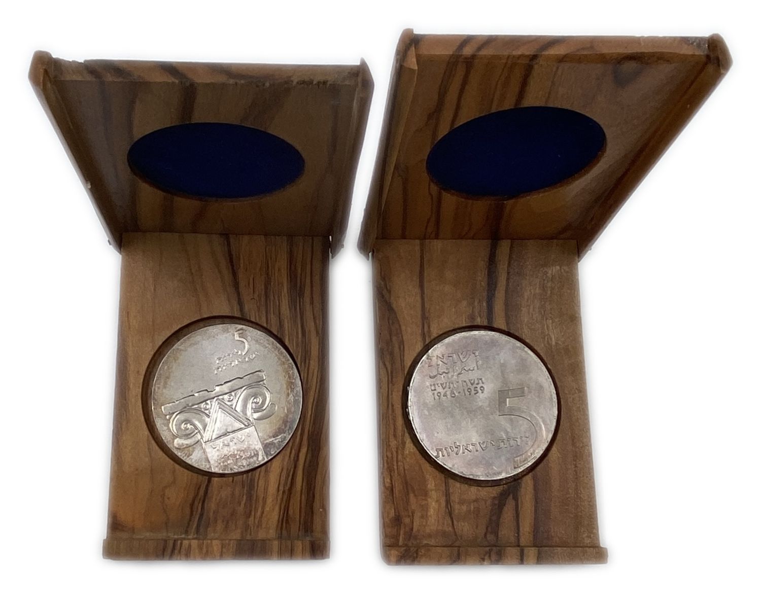 Israel - a pair of coins in an elegant wooden box.
A. 5 pounds - and boys returned to their ... - 1 0