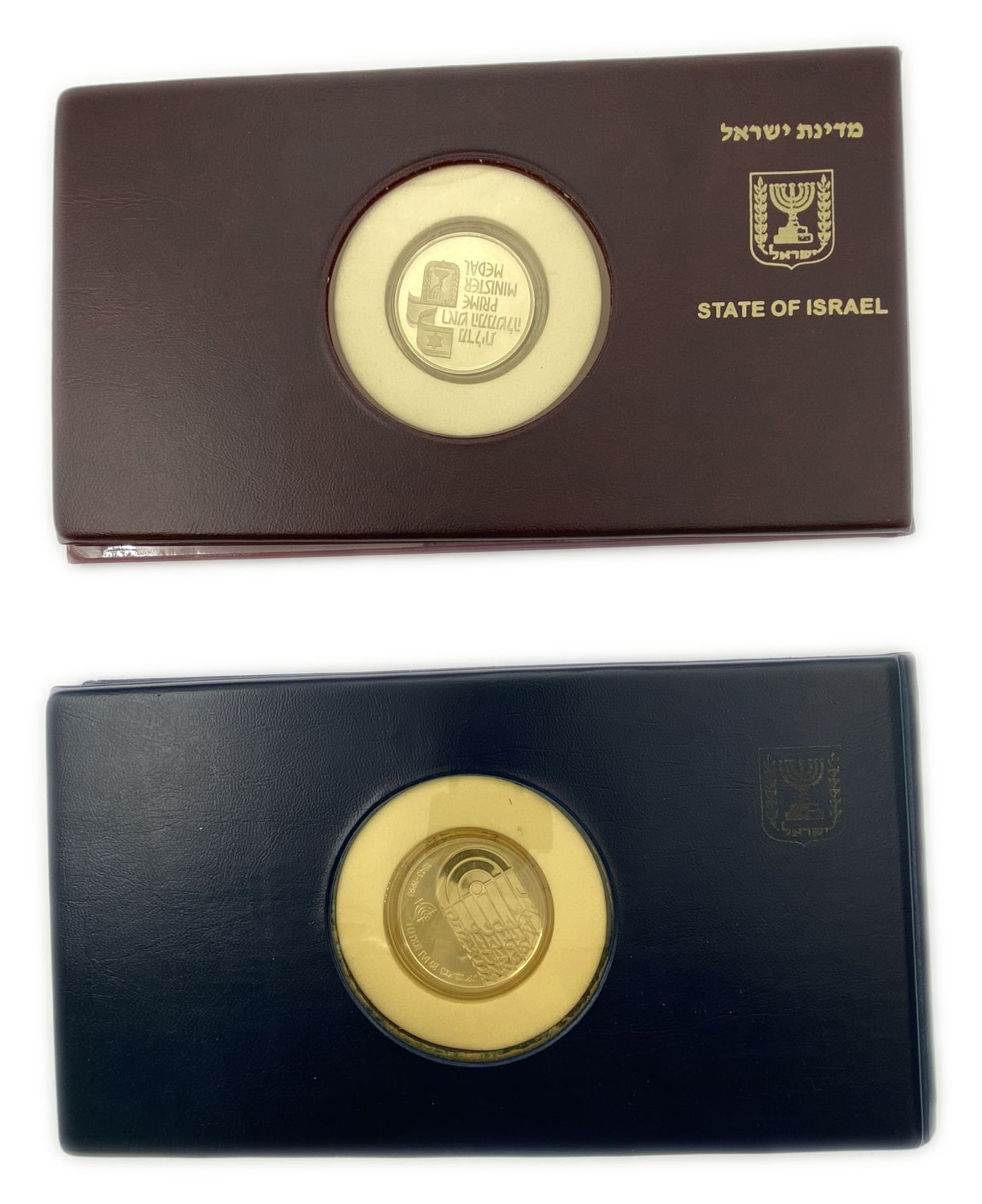 Israel - two folders containing 2 silver coins and one banknote.
First currency: two shekels 1992. ... - 1 0