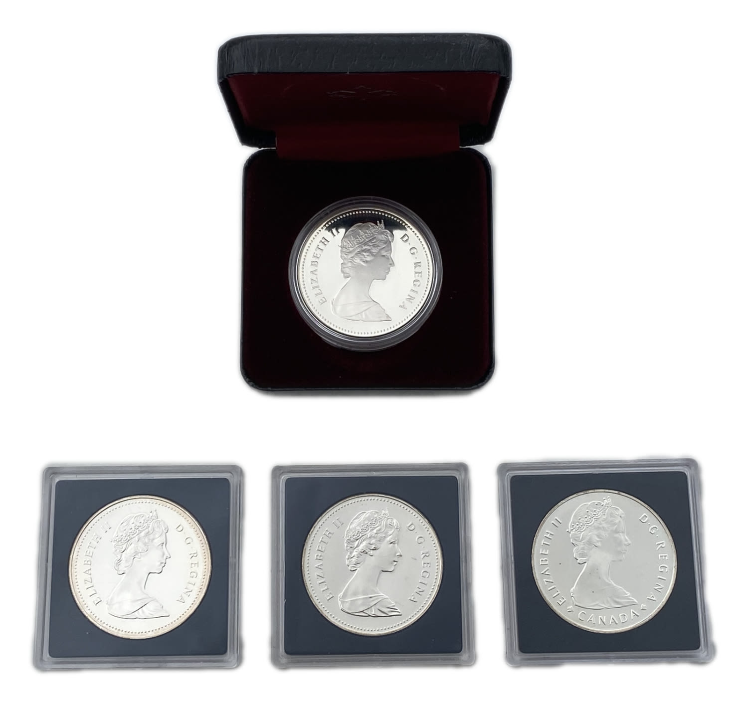 Canada - lot of 4 silver dollar coins from 1983, 1985 1986 - made of silver 500, 23.33g per unit (93.32g in total) - 1 1