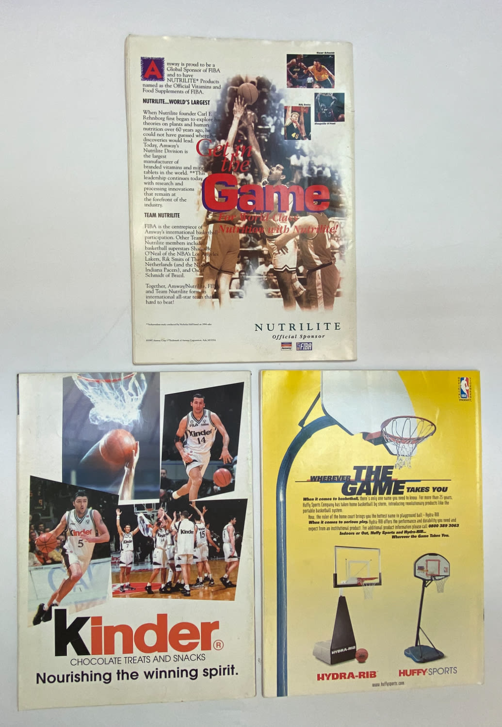 מגזין - מקבץ 3 מגזינים של חברת Fiba Basketball בנושא כדורסל, ליגת ה- NBA - בתאריכים 12/98, 04/99, 11/98 - על השער ... - 1 1
