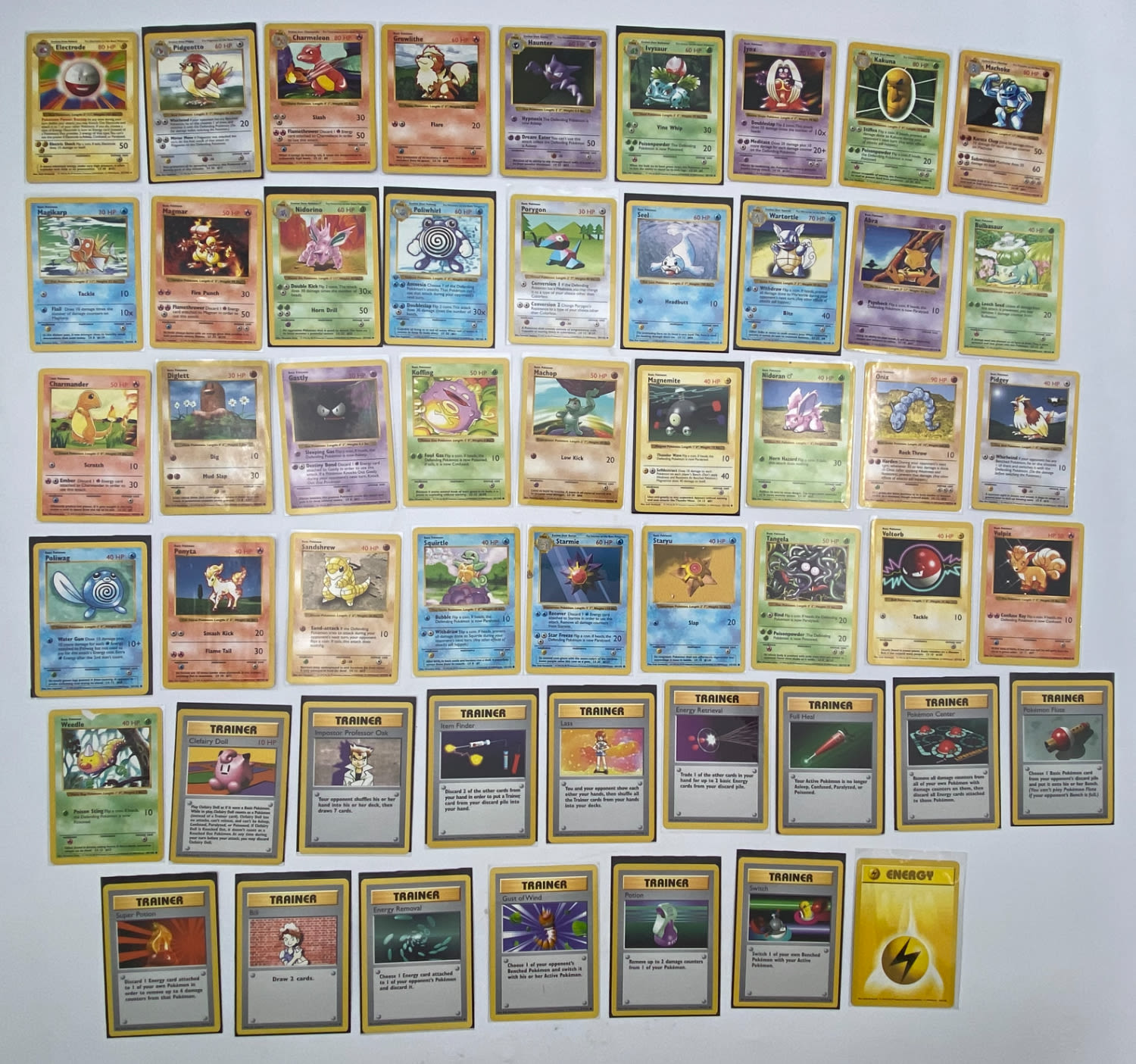 קלפי איסוף - Base Set - לוט של 52 קלפי פוקימון Shadowless, במצבים שונים - רבים מהם במצב NM/LP.
... - 1 0