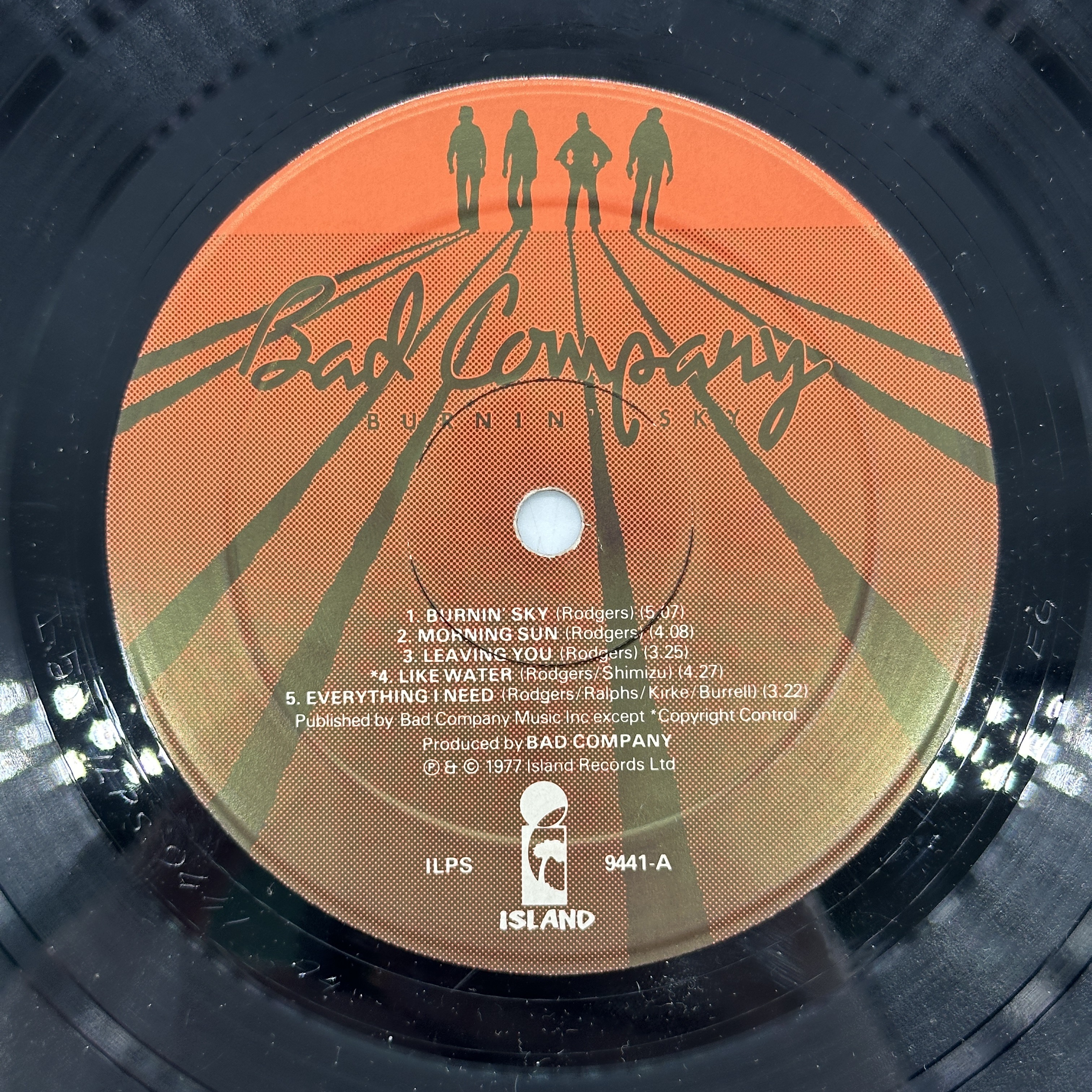 A 12 inch vinyl album by Bad Company - Burning Sky, cover has a few marks on it and some aging, vinyl is in good ... - 1 3