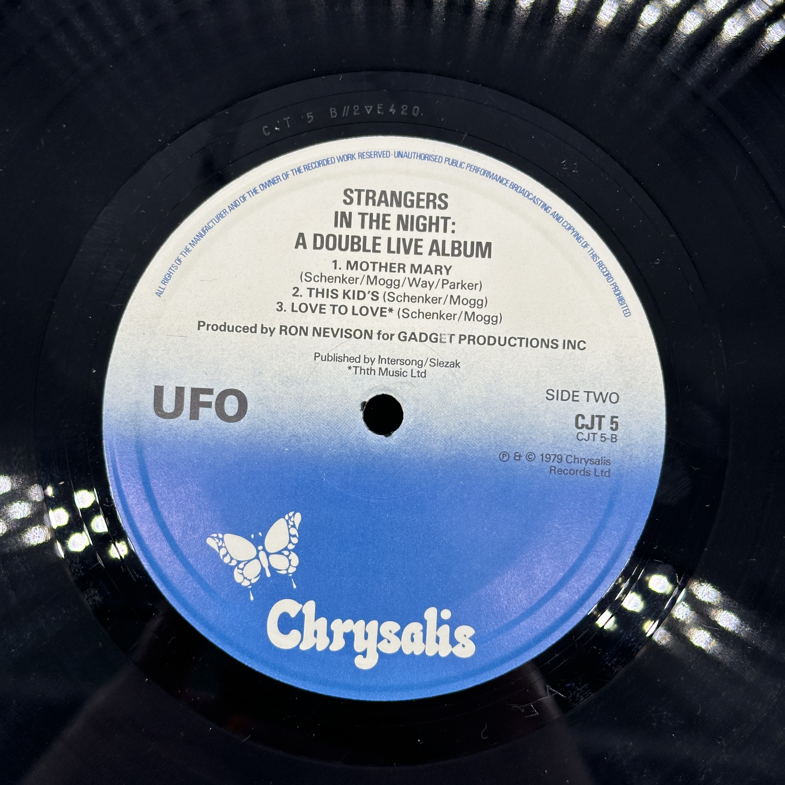 A double 12 inch vinyl by UFO album - Strangers in the Night Live,cover in good condition, vinyls are in good ... - 1 3