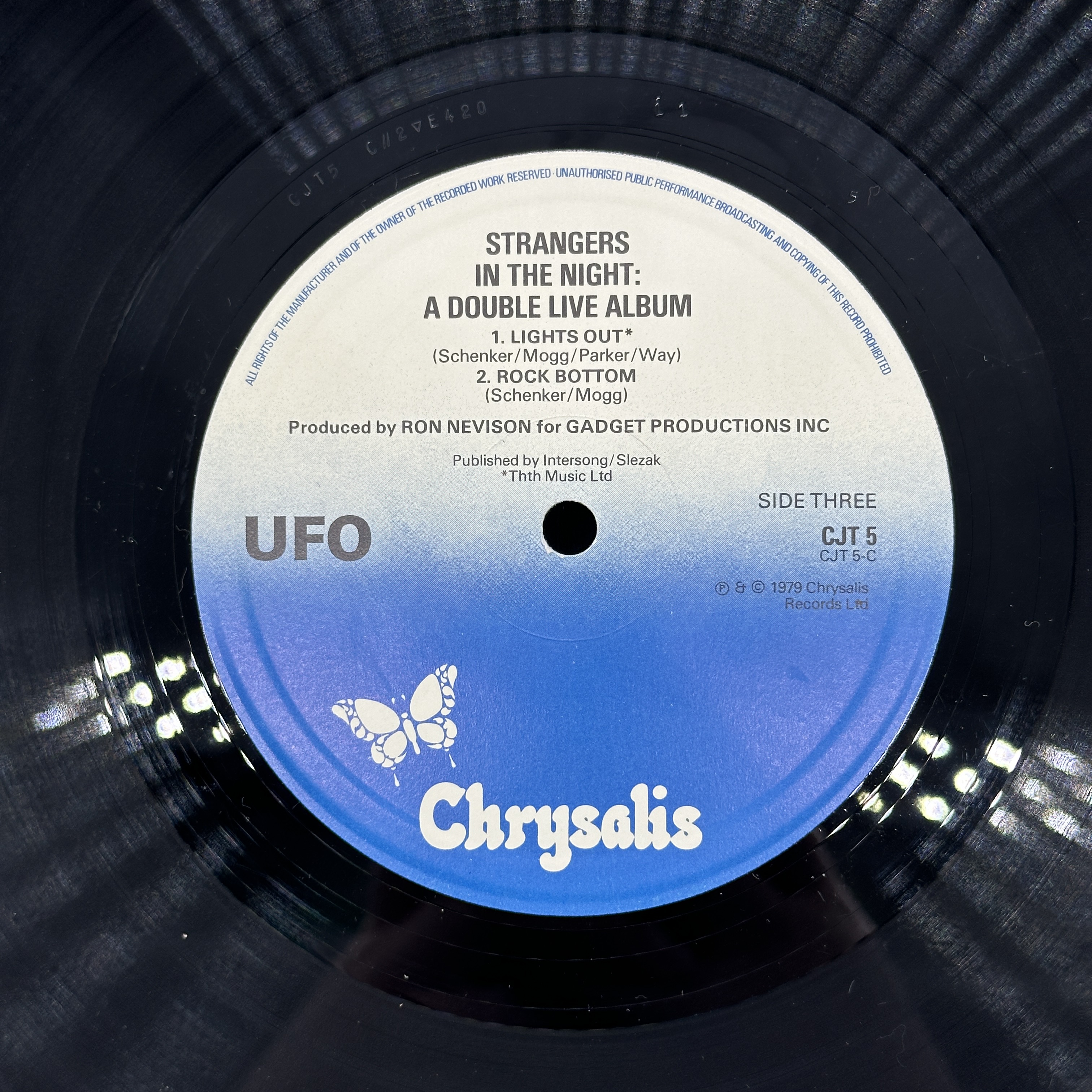 A double 12 inch vinyl by UFO album - Strangers in the Night Live,cover in good condition, vinyls are in good ... - 1 4