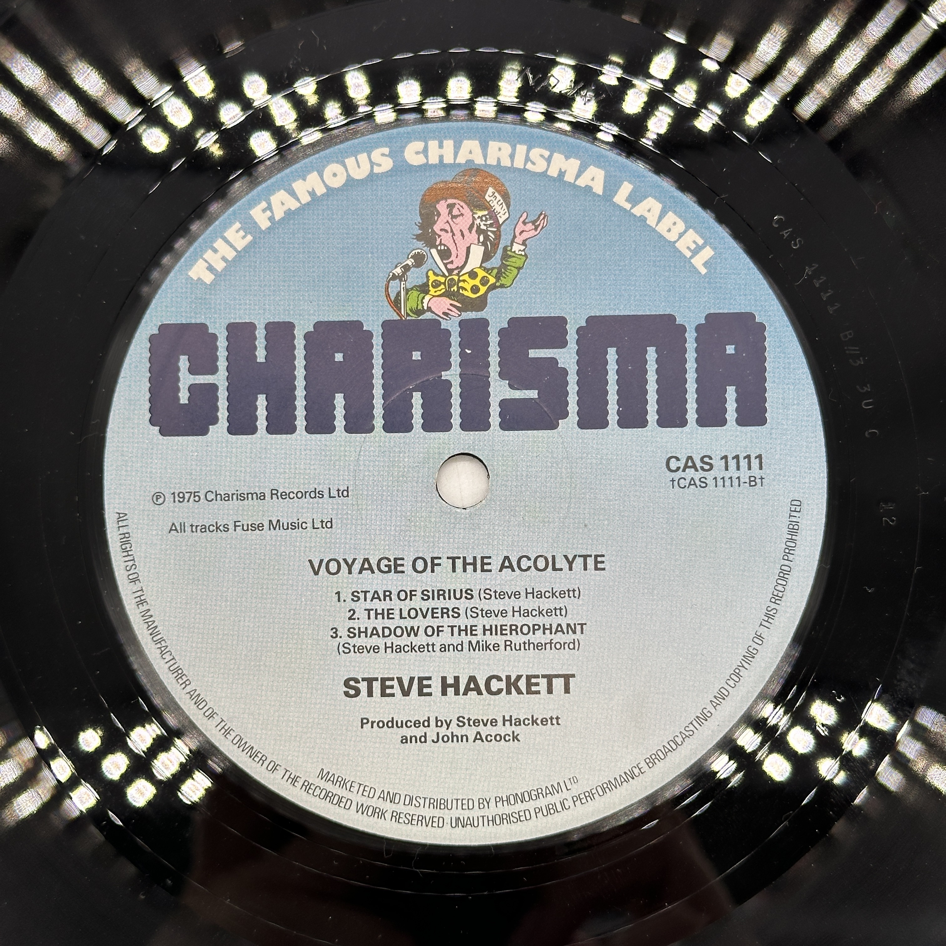 A 12 inch vinyl album by Steve Hackett - Voyage of the Acolyte, cover is in good order, vinyl has no scratches - 1 3