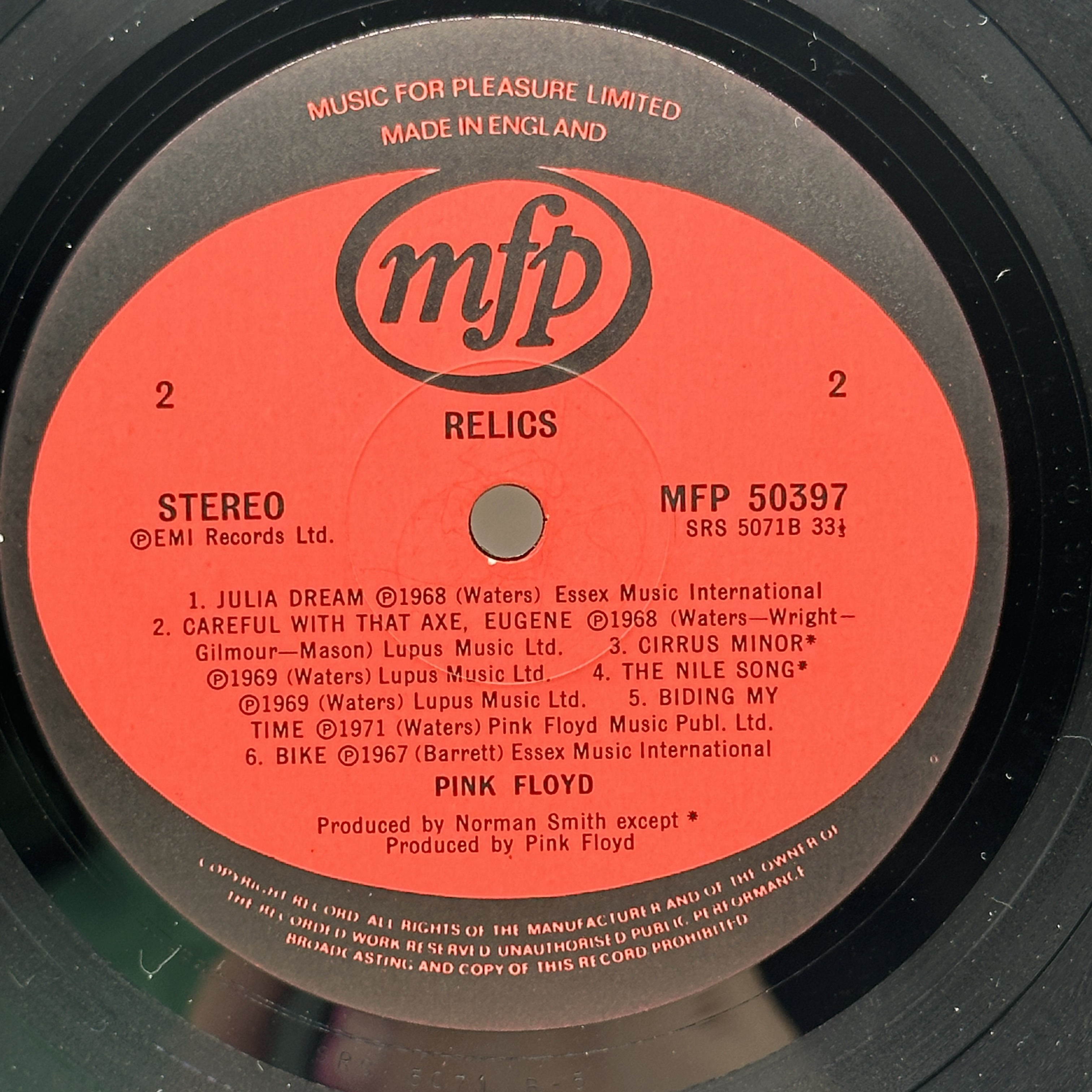 A 12 inch vinyl album by Pink Floyd - Relics, cover has a few age marks on it, vinyl is in good condition, no scratches - 1 3