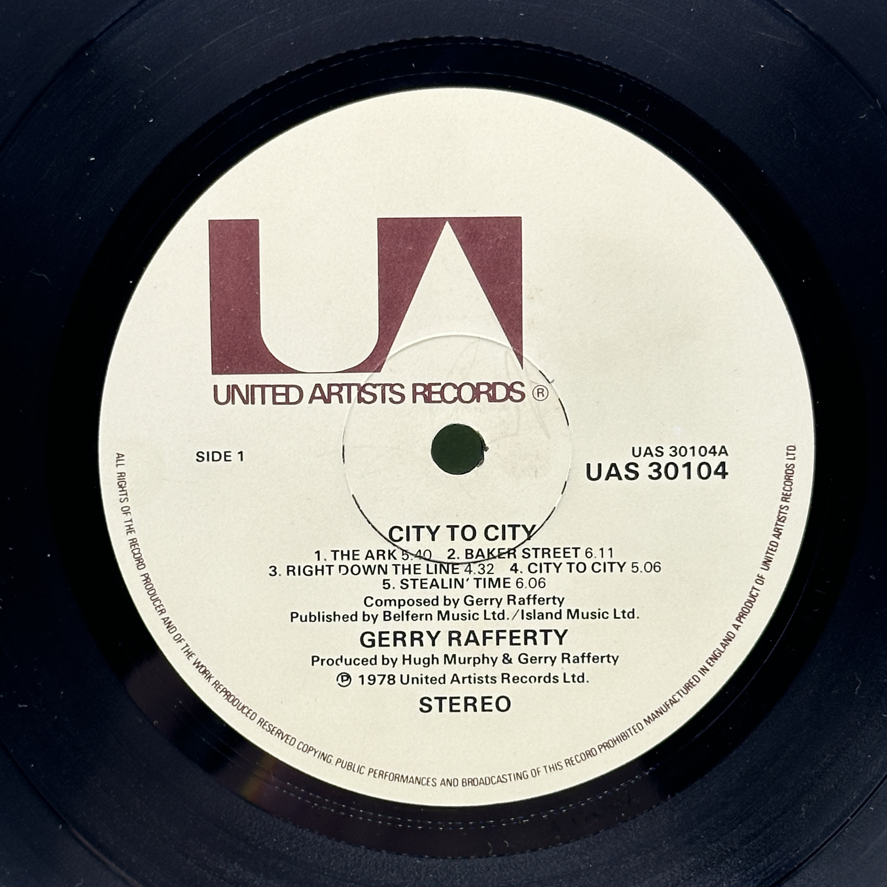 A 12 inch vinyl album by Gerry Rafferty - City to City, cover is in good condition, vinyl is in good order no scratches - 1 2