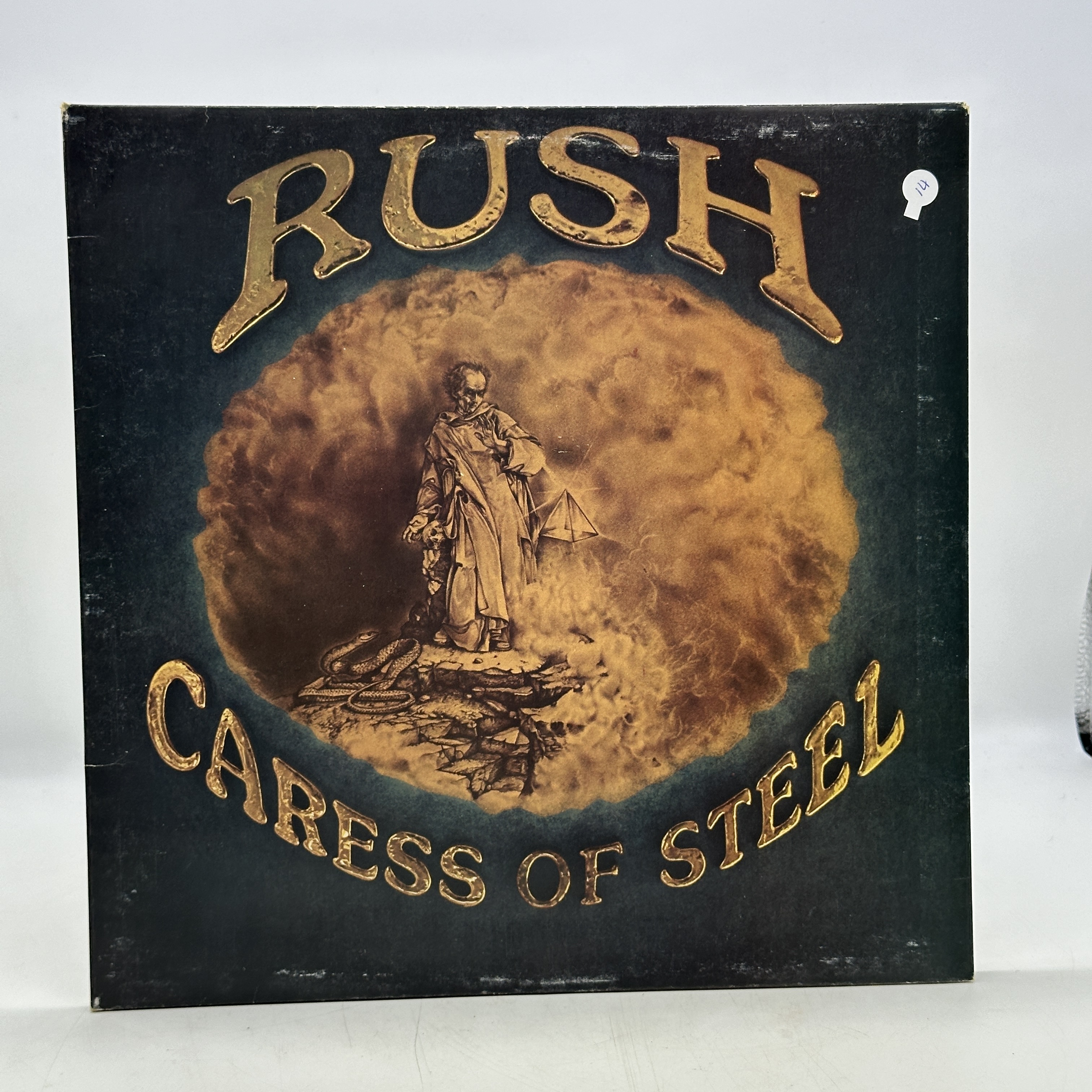 A 12 inch vinyl album by Rush - Caress of Steel, cover is in good order, no scratches - 1 0