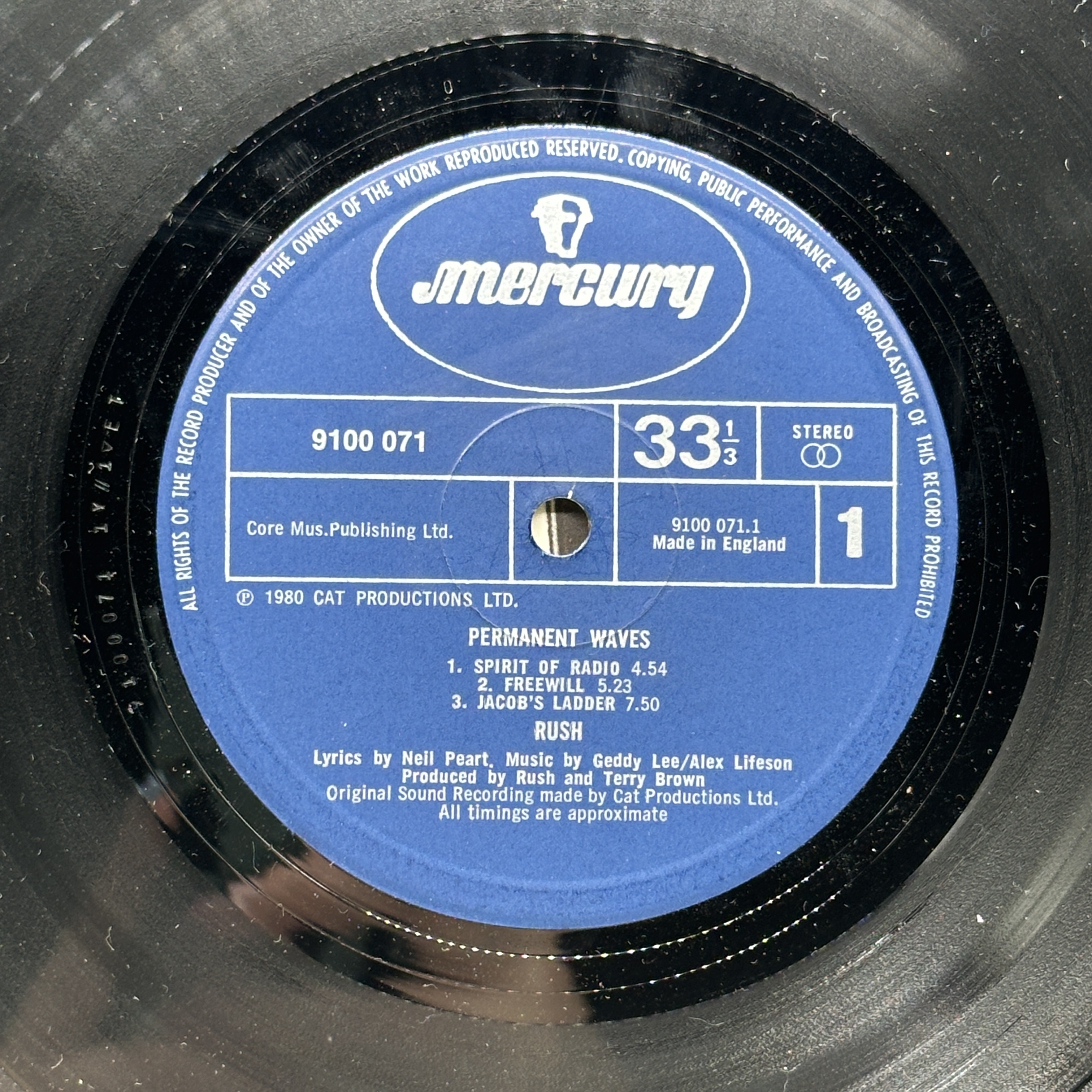 A 12 inch vinyl album by Rush - Permanent Waves, cover is in good condition, vinyl is in good order no scratches - 1 2