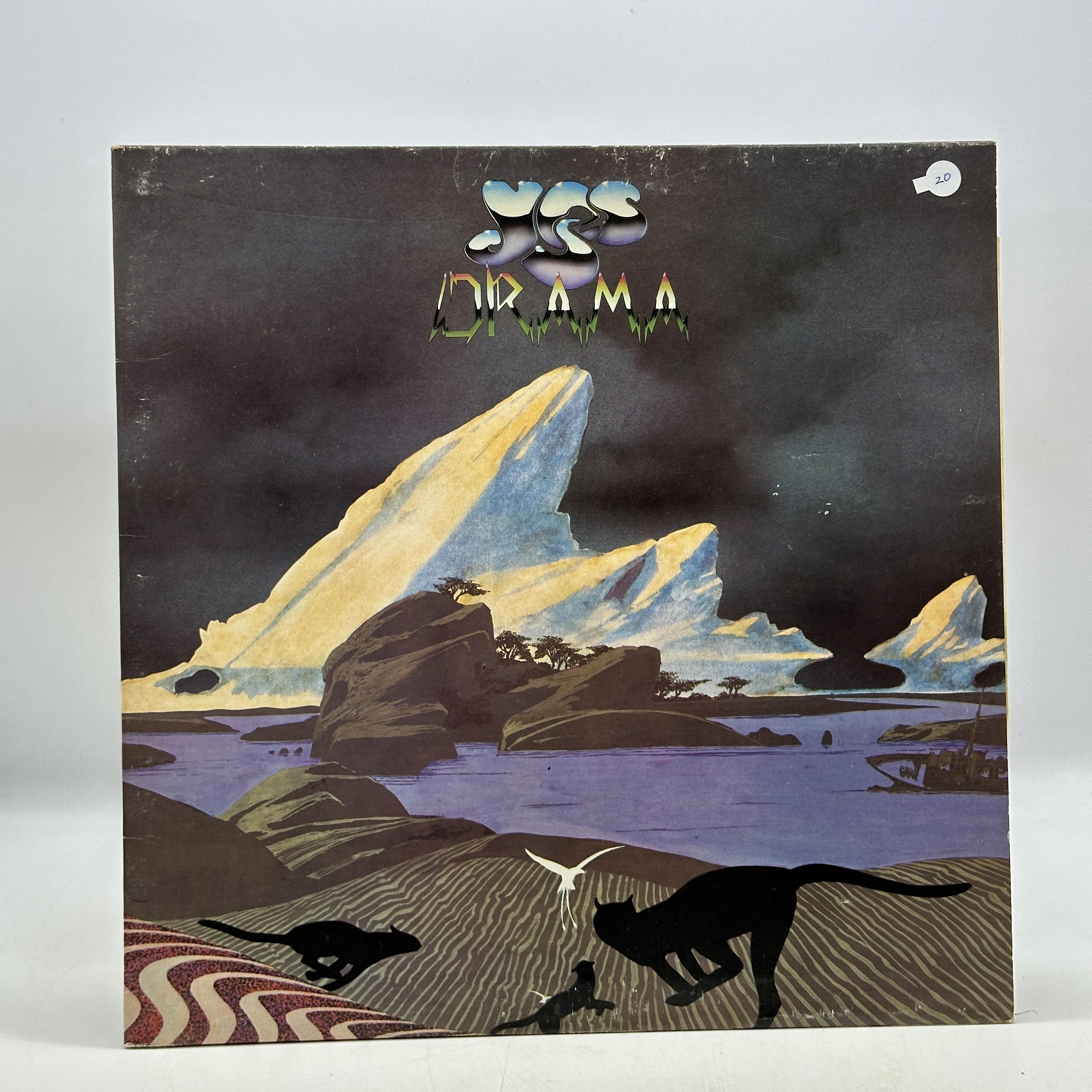 A 12 inch vinyl album by Yes - Drama, in good condition, no scratches, lyric pull out in near new condition - 1 0