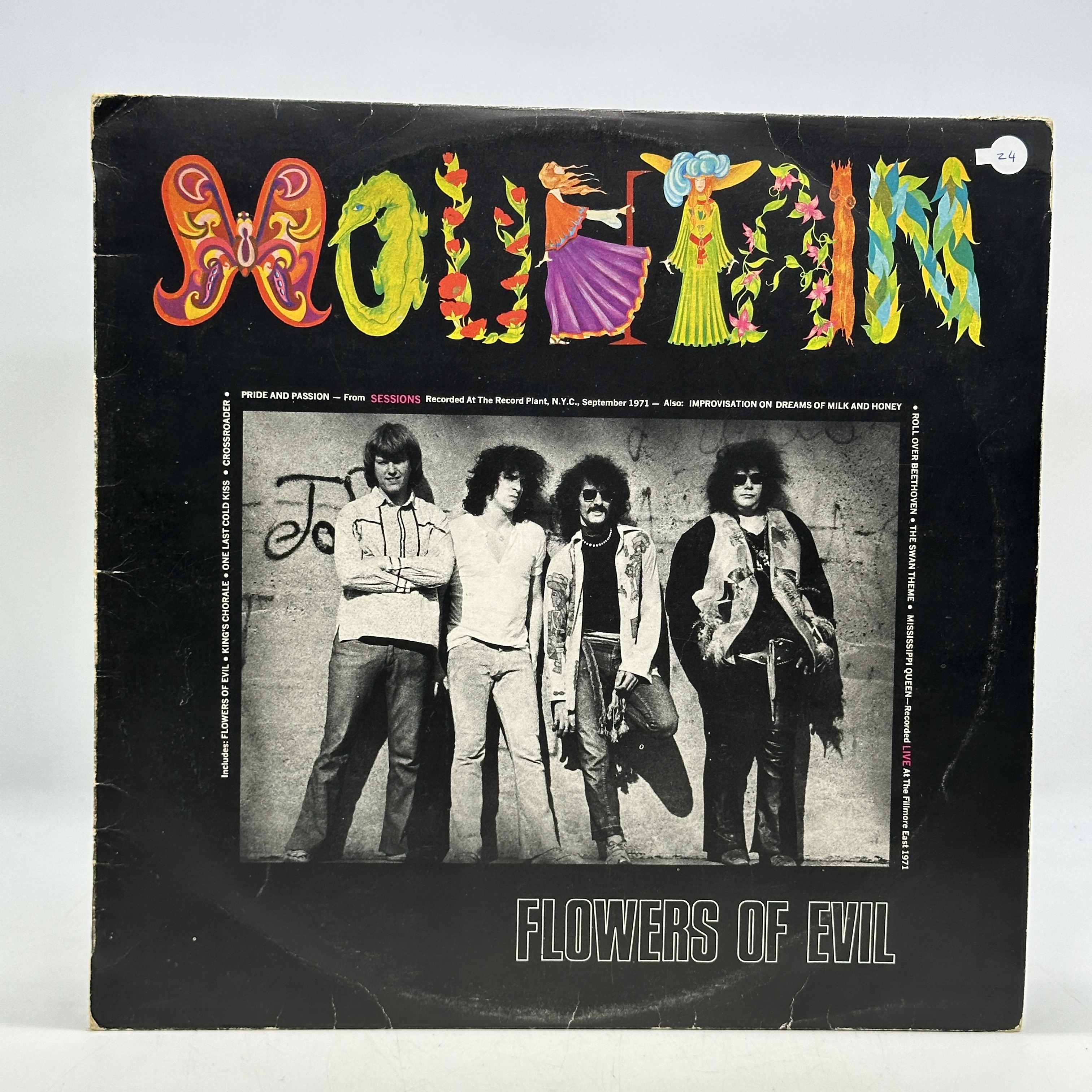 A 12 inch vinyl album by Mountain - Flowers of Evil, cover has some age scuff marks on edges & corners, inner ... - 1 0