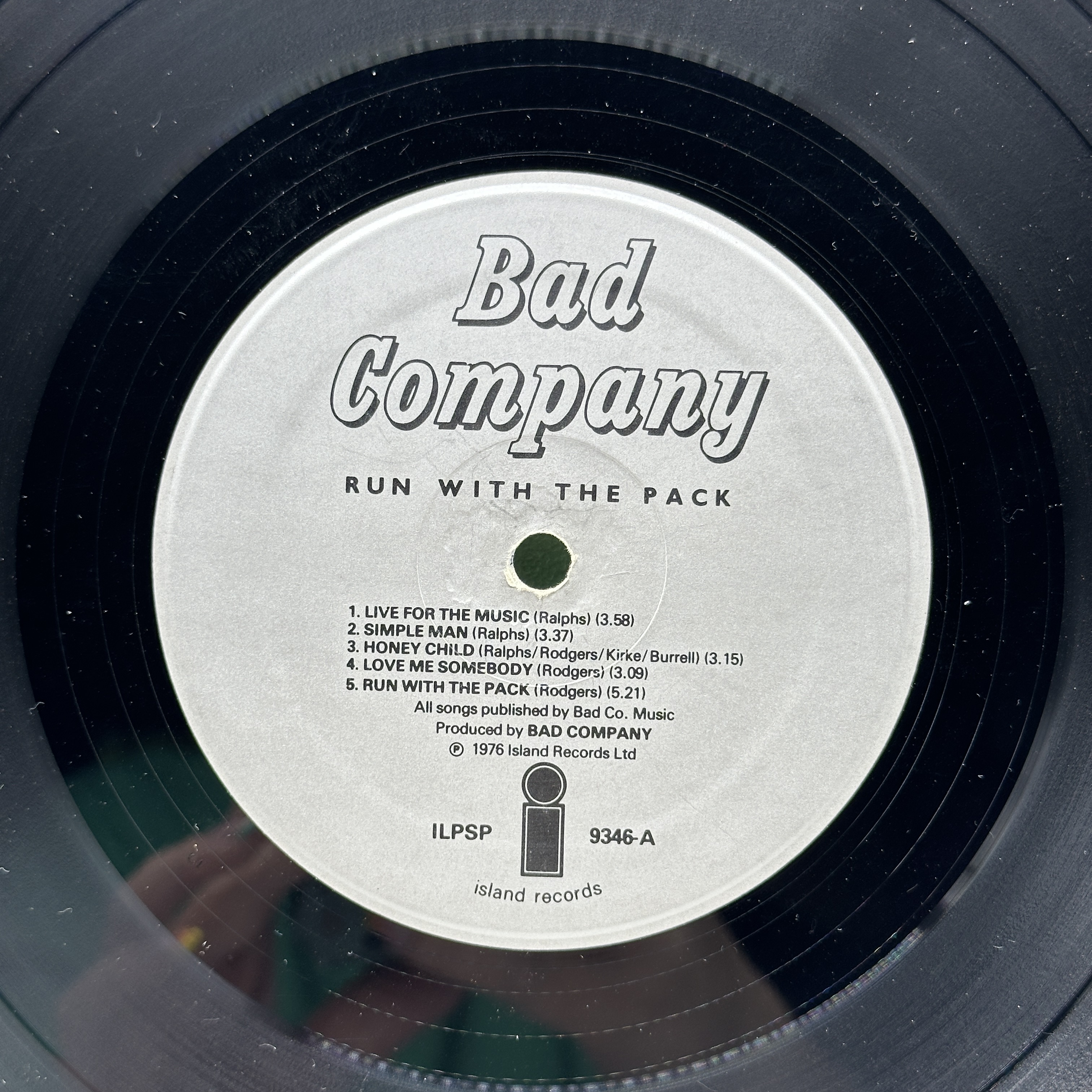 A 12 inch vinyl album by Bad Company - Run With the Pack, cover has some age scuffs on the edges, no scratches on ... - 1 3