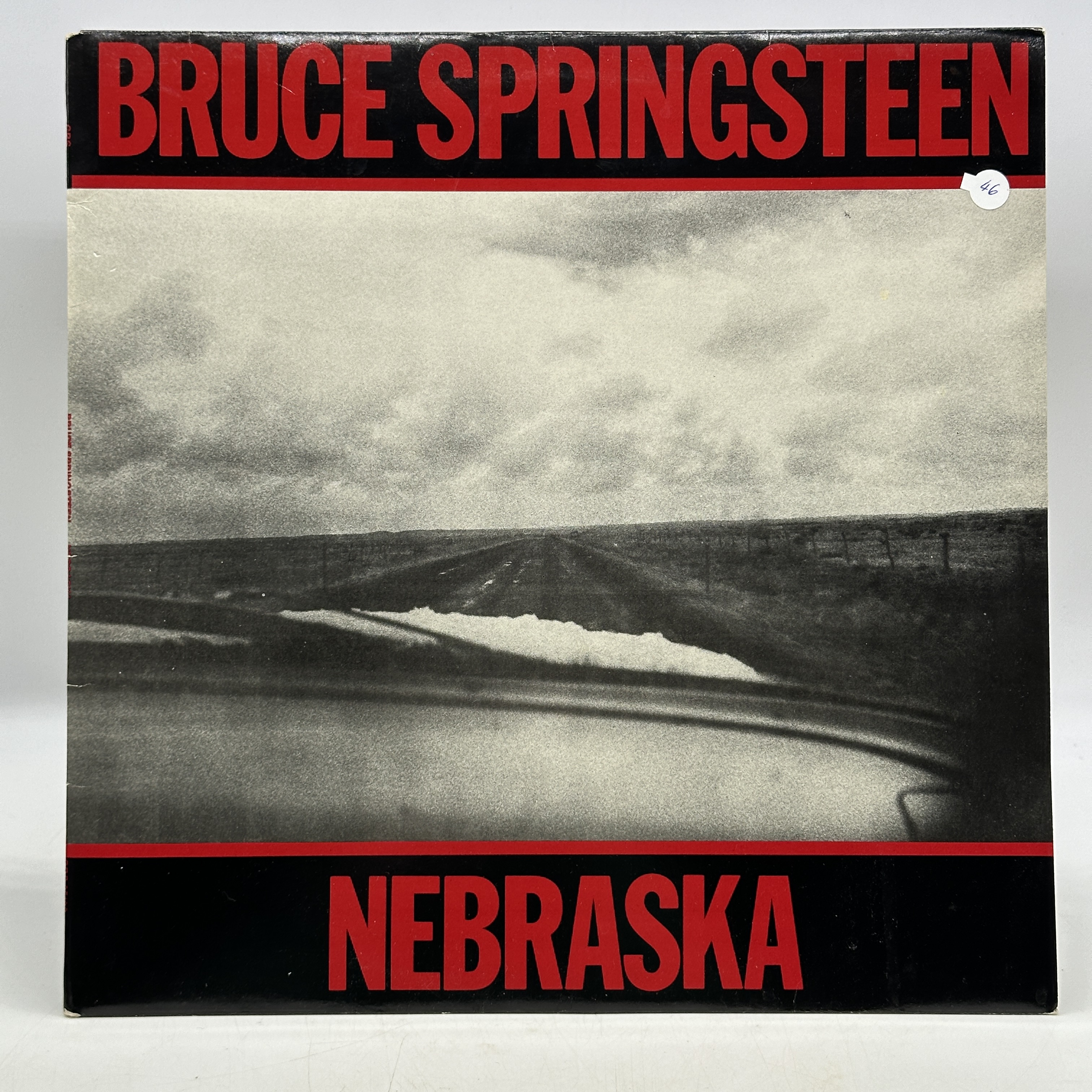 A 12 inch vinyl album by Bruce Springsteen - Nebraska, cover in good order, no scratches - 1 0