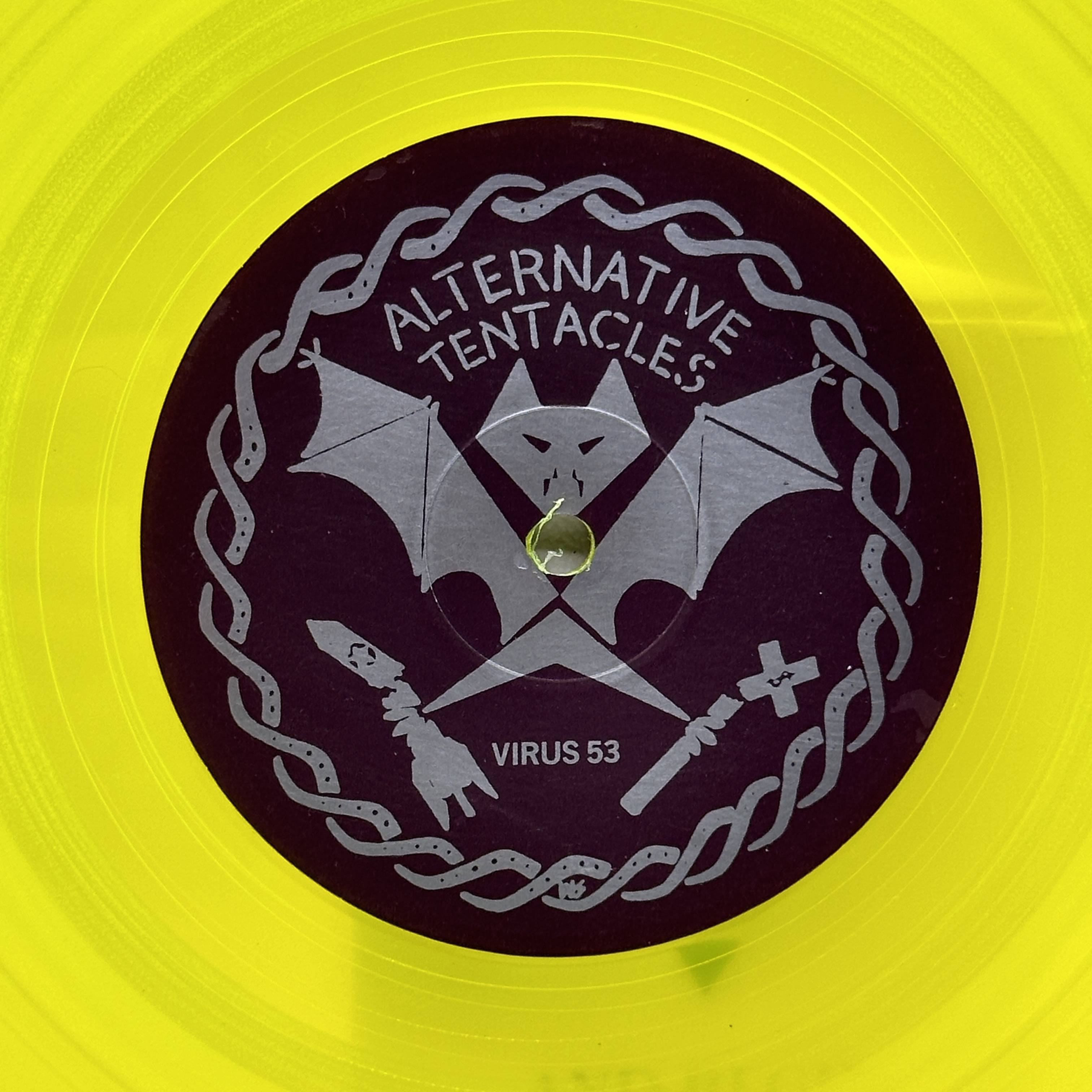 A 12 inch vinyl album by The Crucifucks - Wisconsin, cover in good order, vinyl is bright yellow and in good condition - 1 4