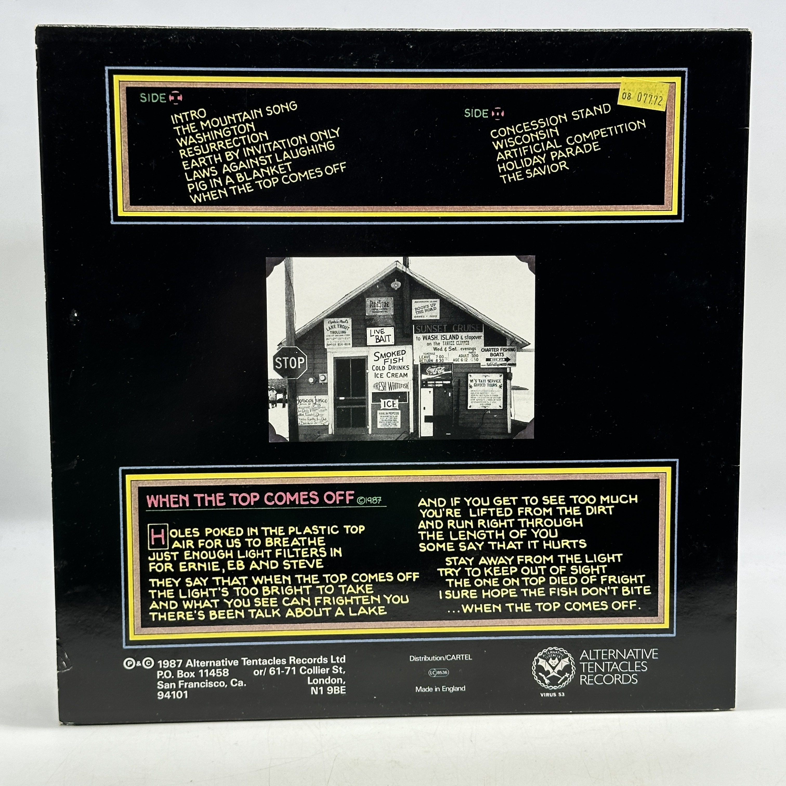 A 12 inch vinyl album by The Crucifucks - Wisconsin, cover in good order, vinyl is bright yellow and in good condition - 1 1