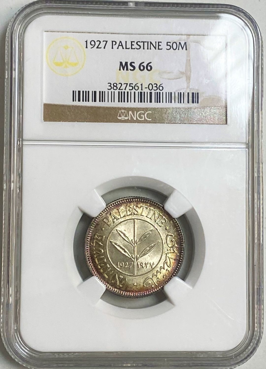 Palestine - 50 Mils 1927 - NGC 66 - UNC - Rainbow Patina - The highest grade known
You can see the ... - 1 4