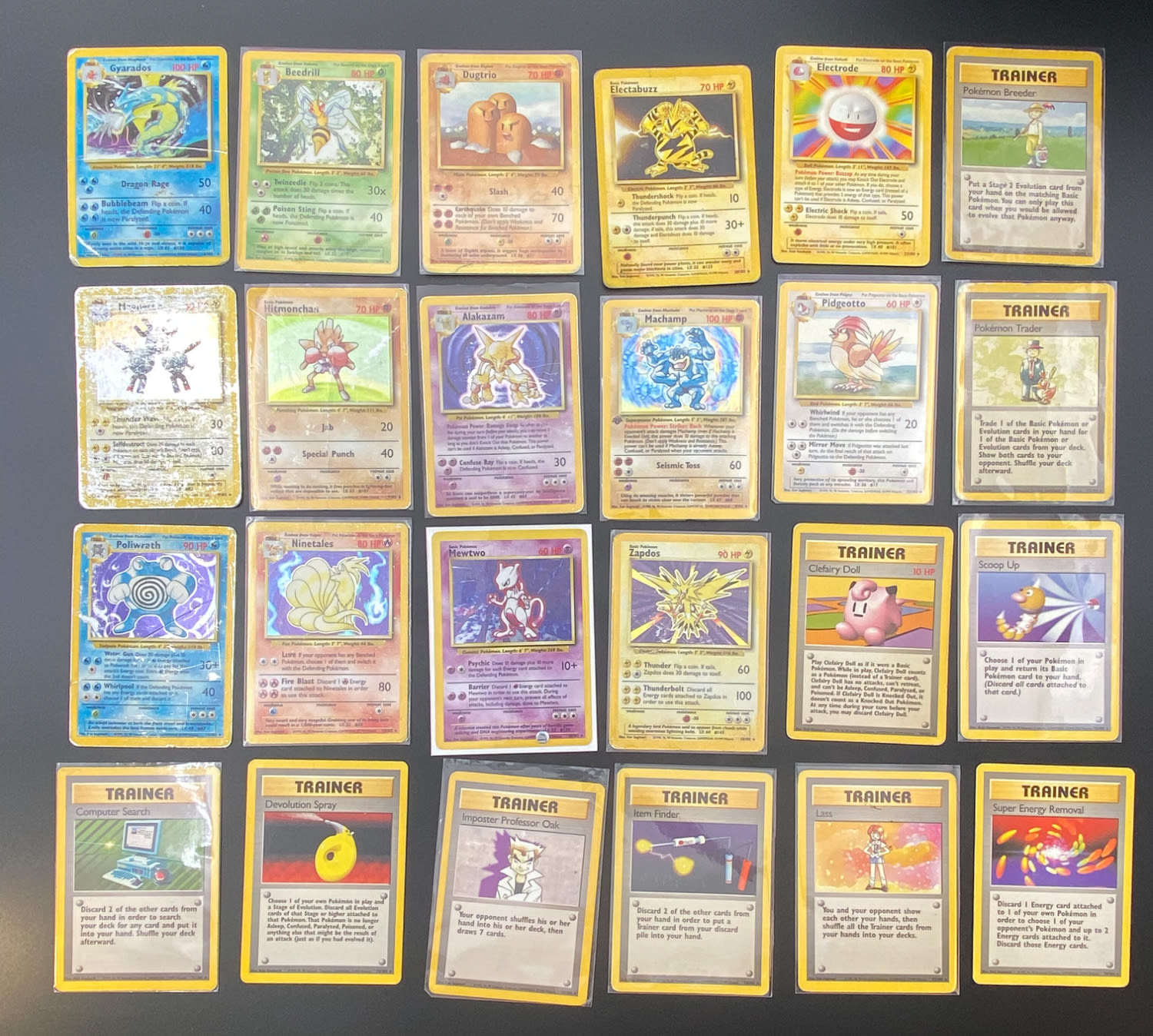 קלפי איסוף - לוט של 24 קלפי פוקימון באנגלית - Rare + Holo Rare - Used - Base Set
פוקימון (באנגלית: ... - 1 0