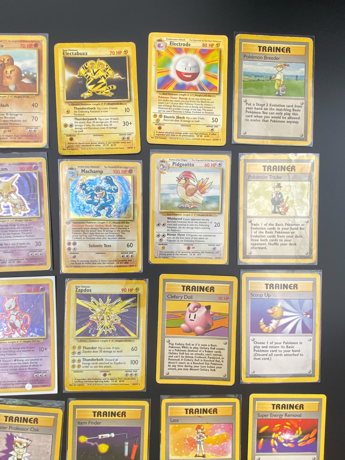 קלפי איסוף - לוט של 24 קלפי פוקימון באנגלית - Rare + Holo Rare - Used - Base Set
פוקימון (באנגלית: ... - 1 2