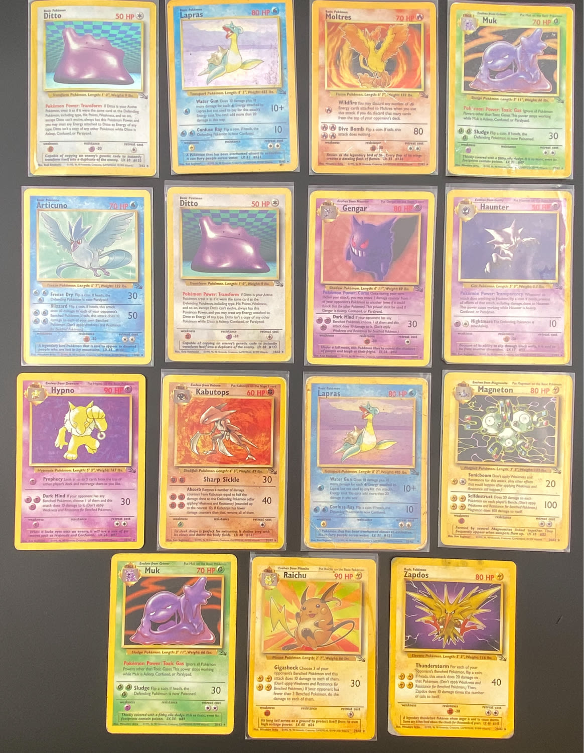 קלפי איסוף - לוט 15 קלפי פוקימון באנגלית - Rare + Holo Rare - Used - מהסט Fossil.
פוקימון (באנגלית: ... - 1 0