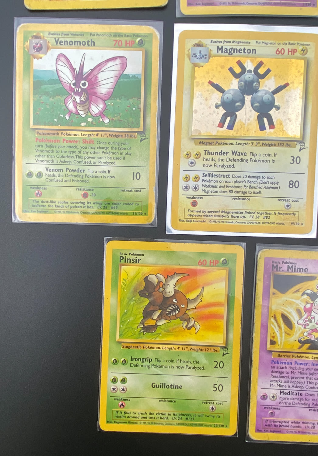 קלפי איסוף - לוט 15 קלפי פוקימון באנגלית - Rare + Holo Rare - Used - מהסט Base Set 2.
פוקימון (באנגלית: ... - 1 4