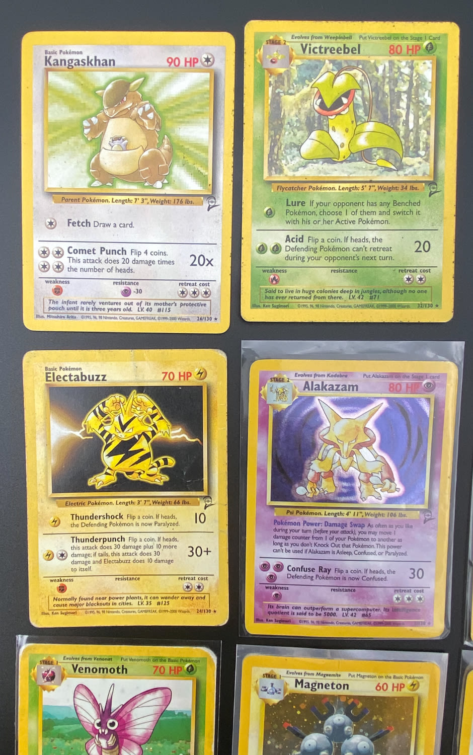 קלפי איסוף - לוט 15 קלפי פוקימון באנגלית - Rare + Holo Rare - Used - מהסט Base Set 2.
פוקימון (באנגלית: ... - 1 1