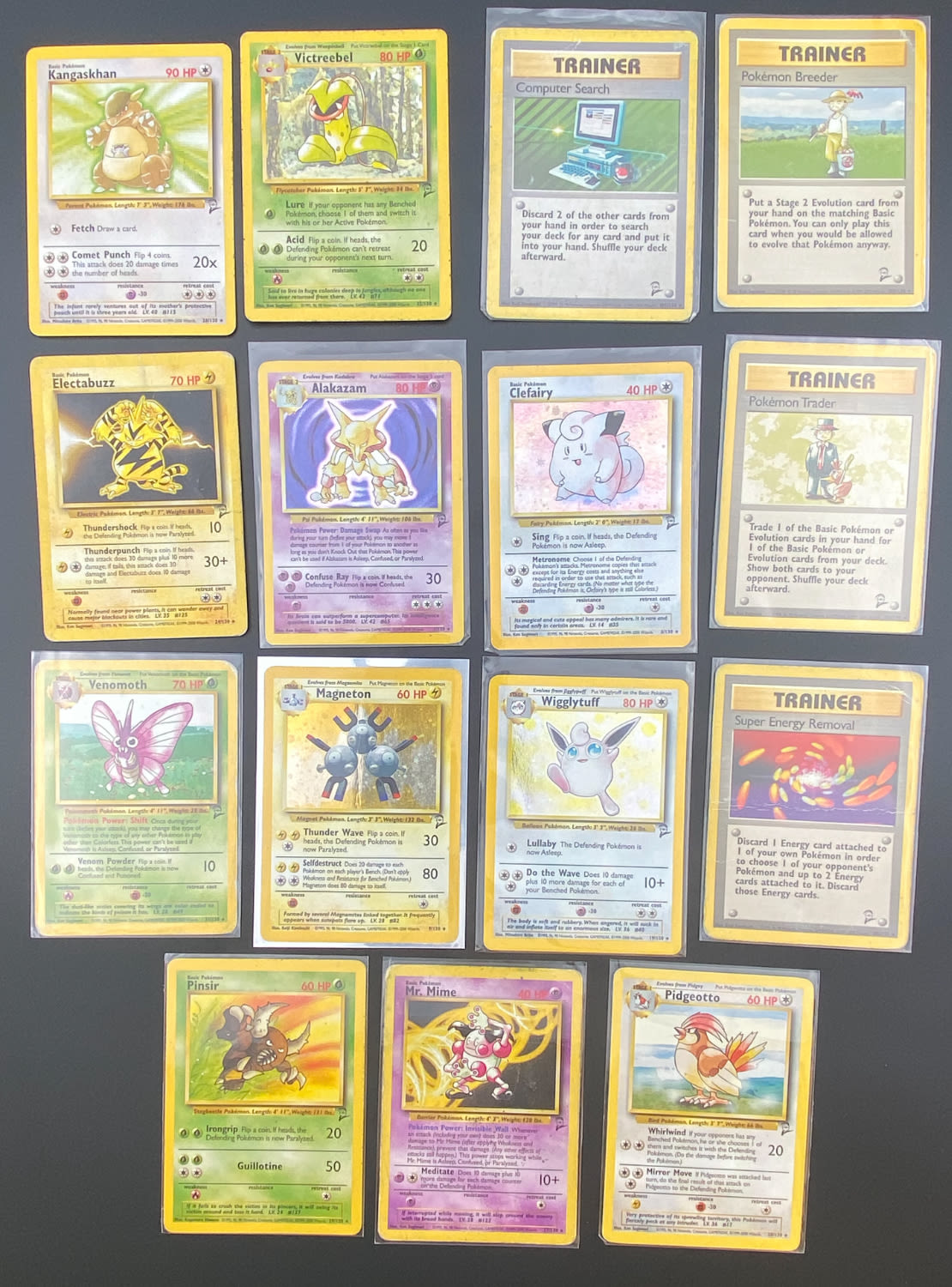 קלפי איסוף - לוט 15 קלפי פוקימון באנגלית - Rare + Holo Rare - Used - מהסט Base Set 2.
פוקימון (באנגלית: ... - 1 0