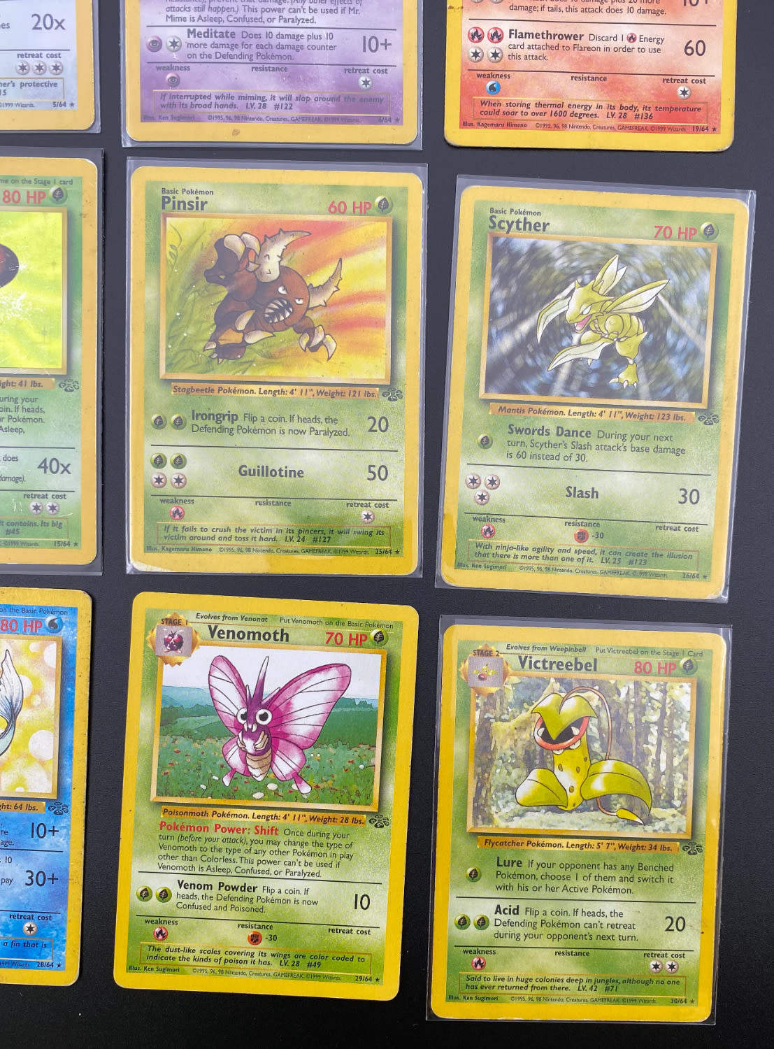 קלפי איסוף - לוט 17 קלפי פוקימון באנגלית - Rare + Holo Rare - Used - מהסט Jungle.
פוקימון (באנגלית: ... - 1 3