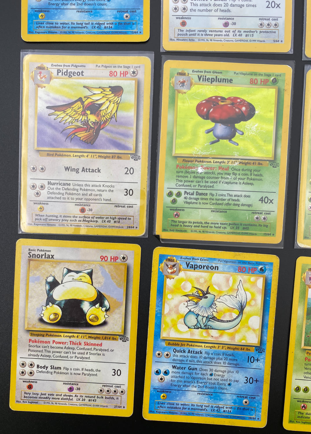 קלפי איסוף - לוט 17 קלפי פוקימון באנגלית - Rare + Holo Rare - Used - מהסט Jungle.
פוקימון (באנגלית: ... - 1 4