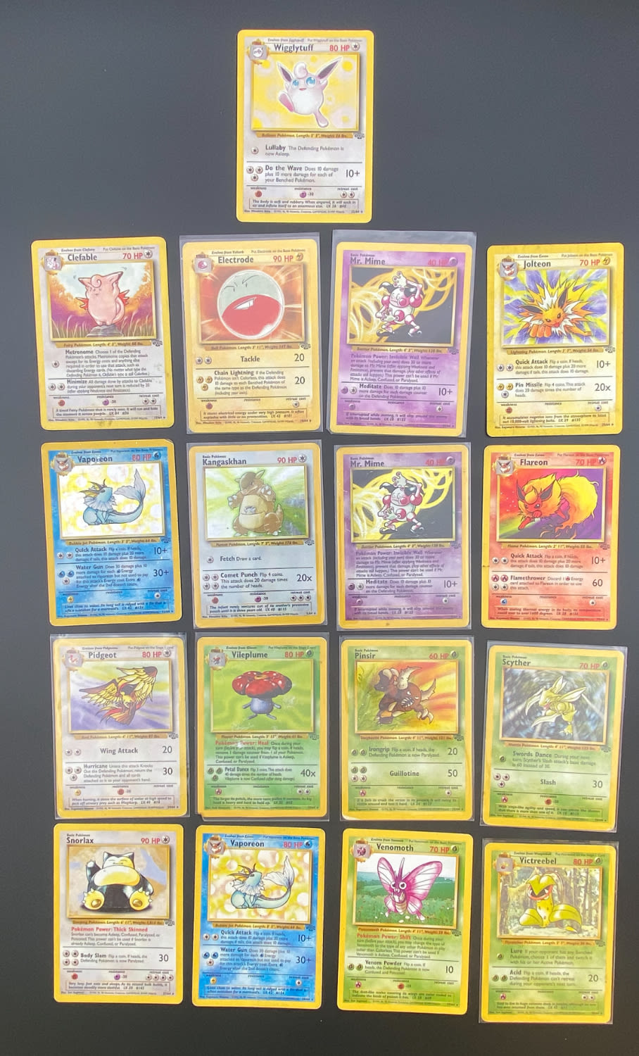 קלפי איסוף - לוט 17 קלפי פוקימון באנגלית - Rare + Holo Rare - Used - מהסט Jungle.
פוקימון (באנגלית: ... - 1 0