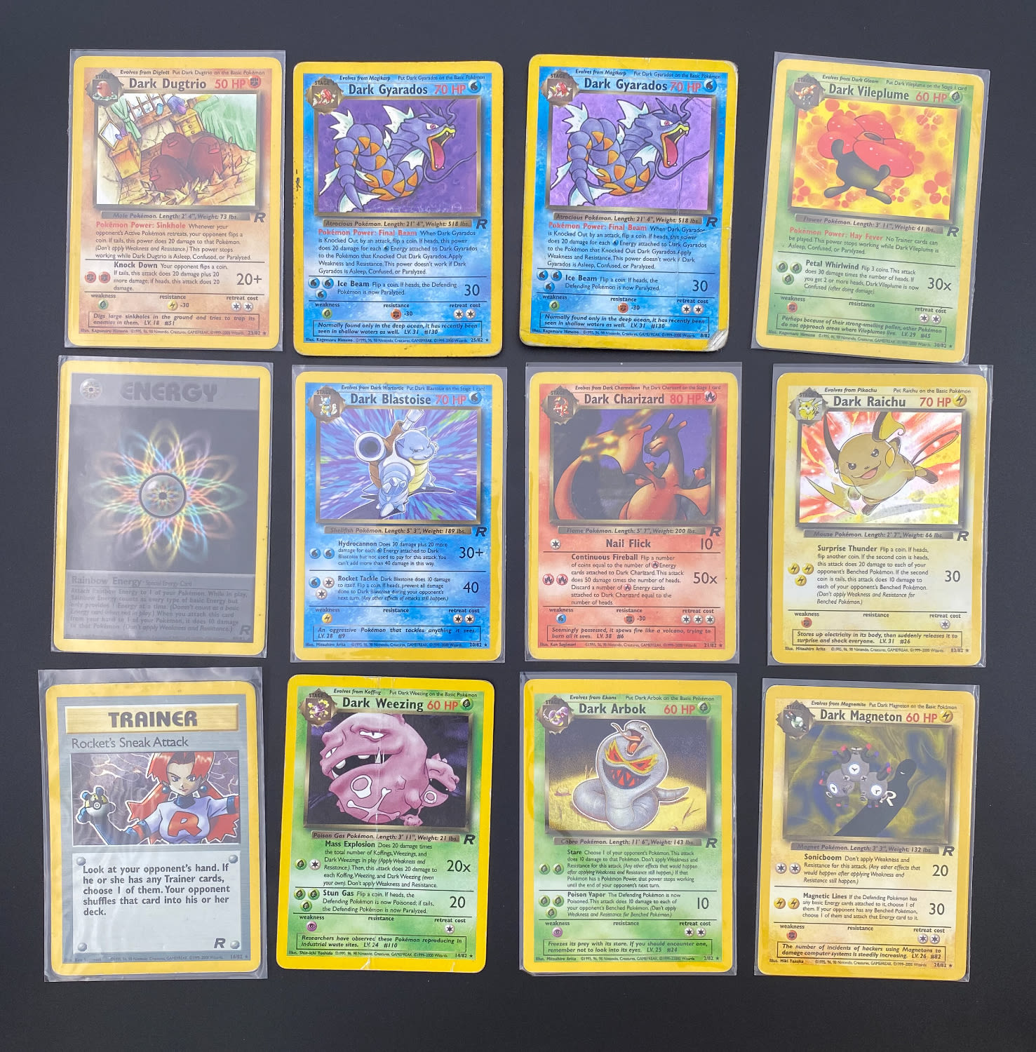 קלפי איסוף - לוט 12 קלפי פוקימון באנגלית - Rare + Holo Rare - Used - מהסט Team Rocket.
פוקימון (באנגלית: ... - 1 0